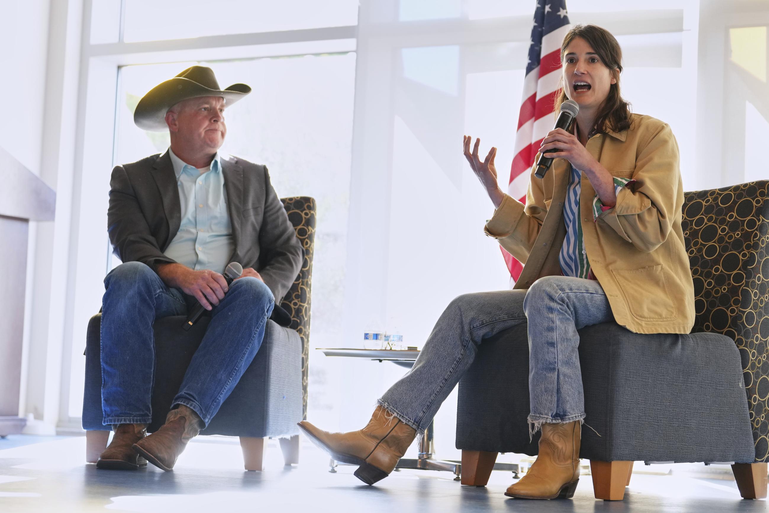 Rep. Marie Gluesenkamp Perez, D-Wash., right, speaks during town hall event with Lewis County Commissioner Scott Brummer, left, at Centralia College, Tuesday, April 22, 2025, in Centralia, Wash. (AP Photo/Lindsey Wasson)