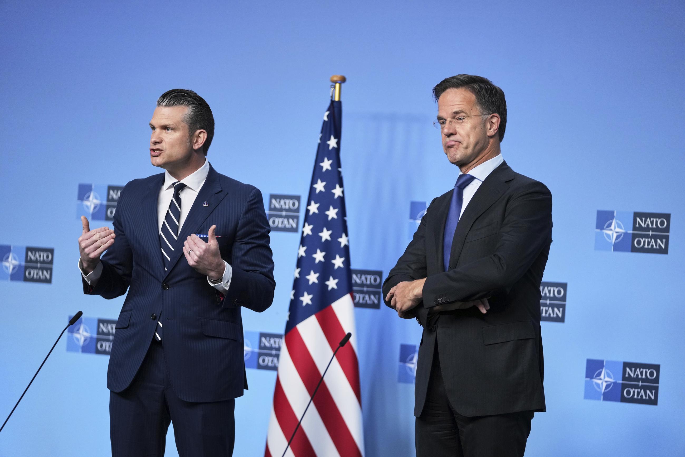 Defense Secretary Pete Hegseth and NATO Secretary General Mark Rutte deliver statements ahead of a meeting of defense ministers at NATO headquarters in Brussels on June 5. (AP Photo/Virginia Mayo)