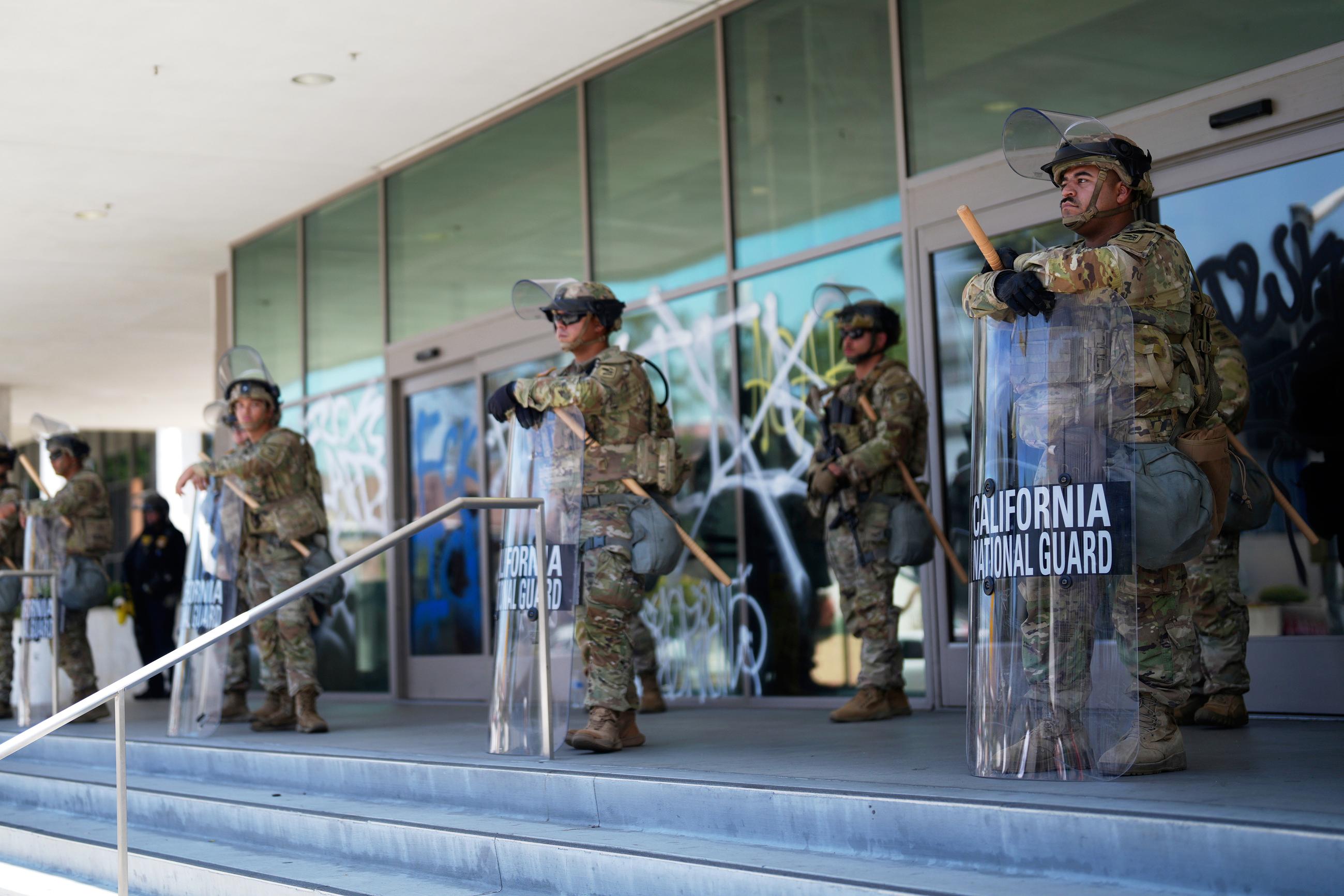 National Guard protecting a federal building after anti-ICE protests in downtown Los Angeles on Tuesday. (AP Photo/Eric Thayer)