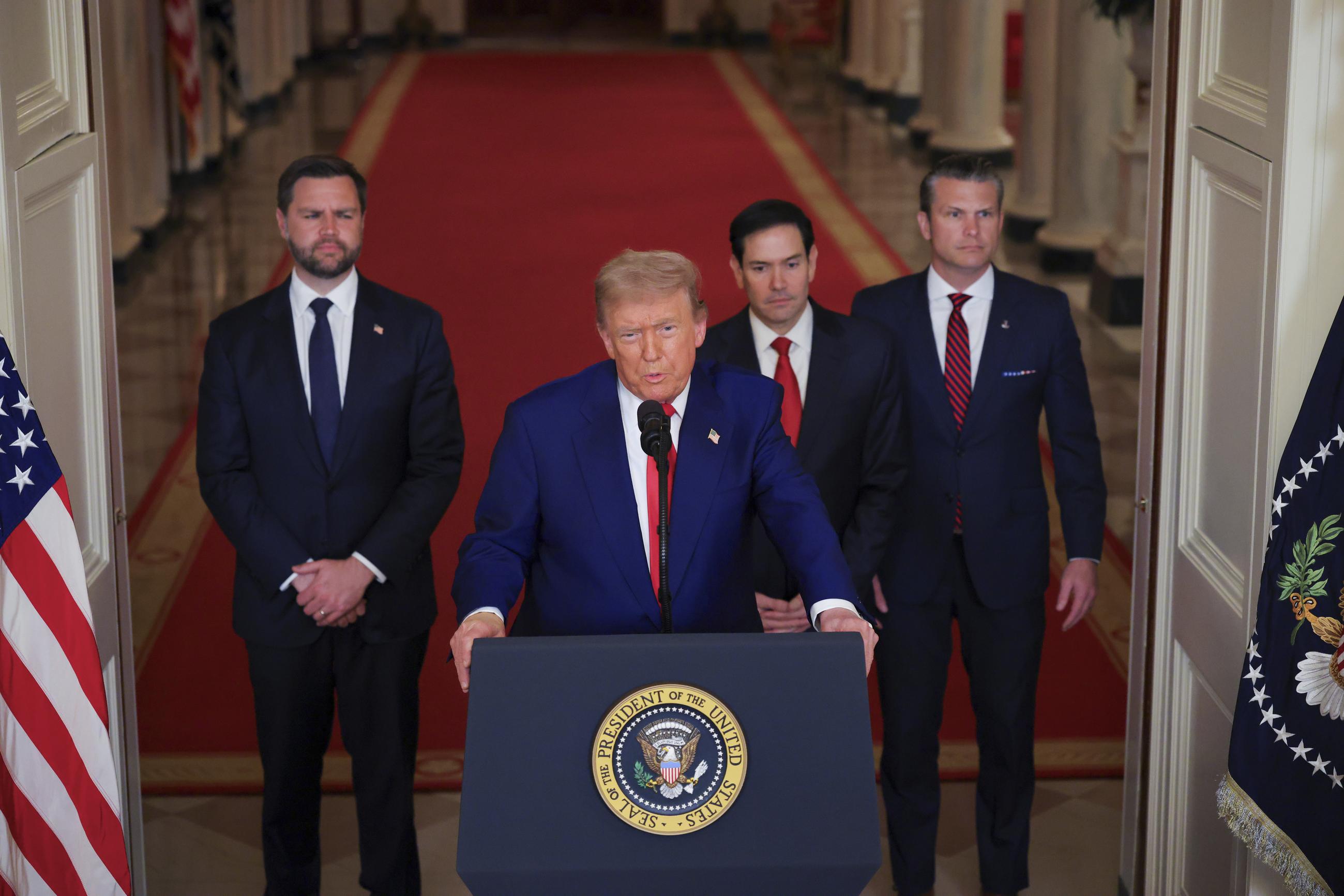 President Donald Trump speaks from the East Room of the White House in Washington, Saturday, June 21, 2025, after the U.S. military struck three Iranian nuclear and military sites, directly joining Israel's effort to decapitate the country's nuclear program, as Vice President JD Vance, Secretary of State Marco Rubio and Defense Secretary Pete Hegseth listen. (Carlos Barria/Pool via AP)
