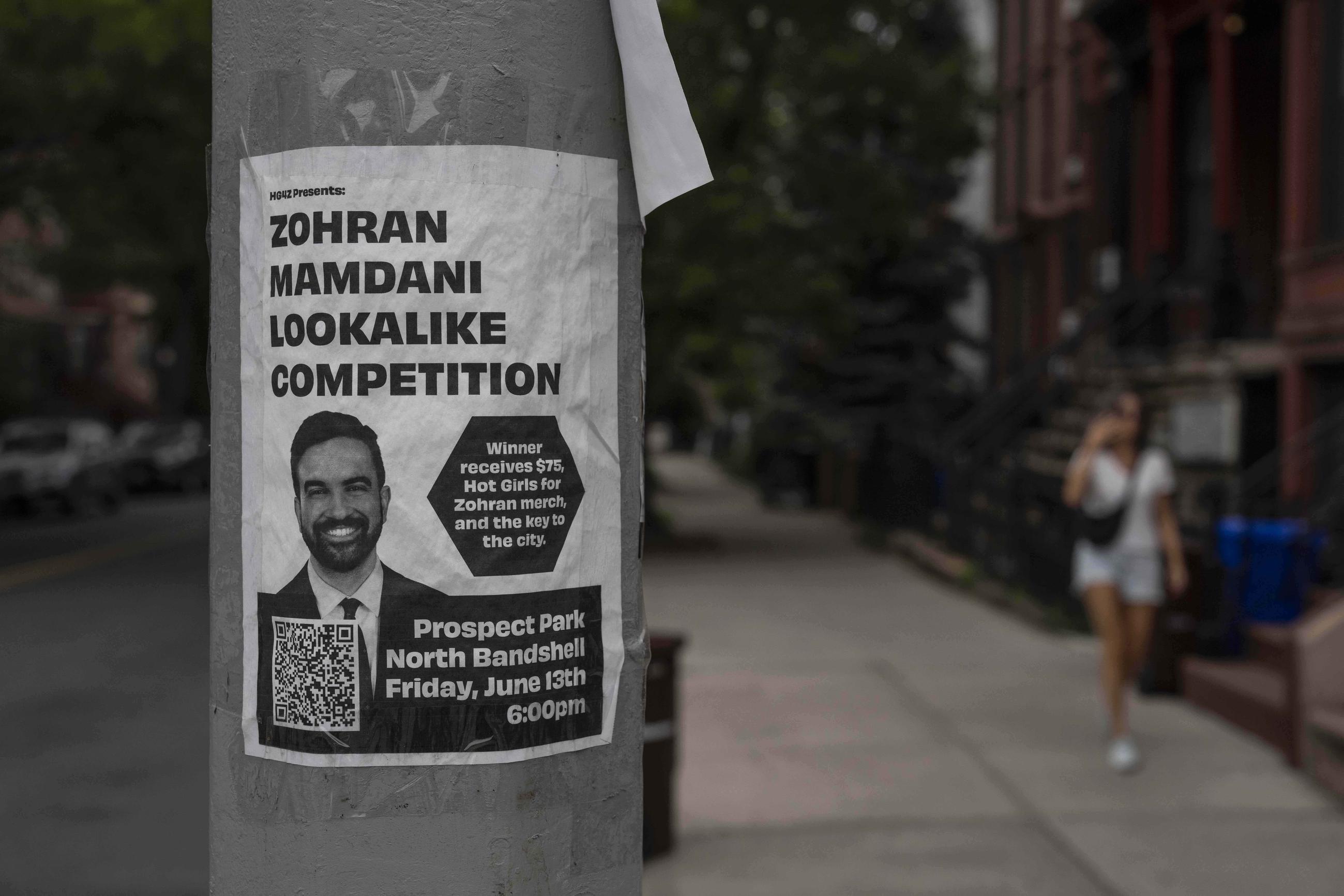 A poster for mayoral candidate Zohran Mamdani's lookalike competition is advertised on a traffic pole in New York City on June 26. (AP Photo/Yuki Iwamura)