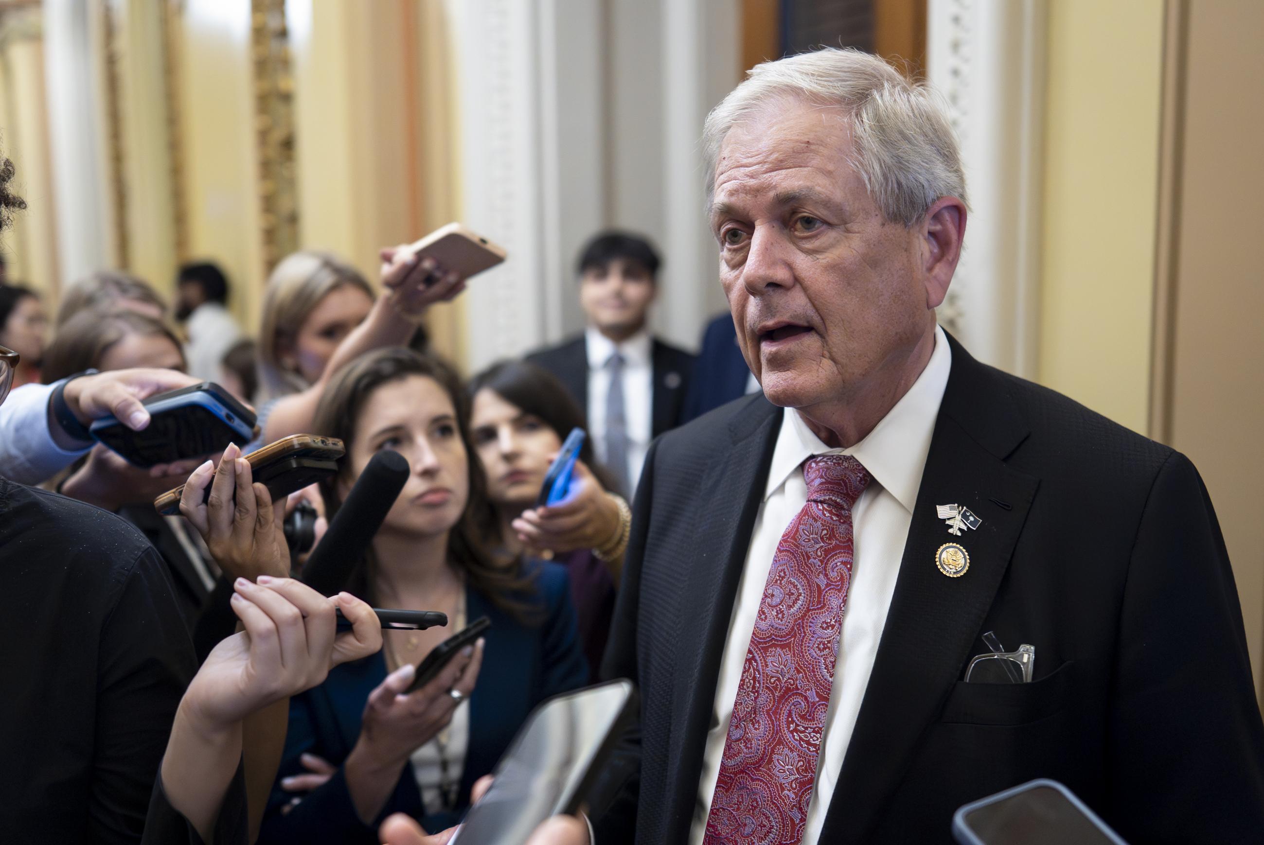 Rep. Ralph Norman, a member of the conservative House Freedom Caucus, speaks to reporters following a meeting at the White House on Wednesday, as Republicans worked to push President Trump's reconciliation bill across the finish line. (AP Photo/J. Scott Applewhite)