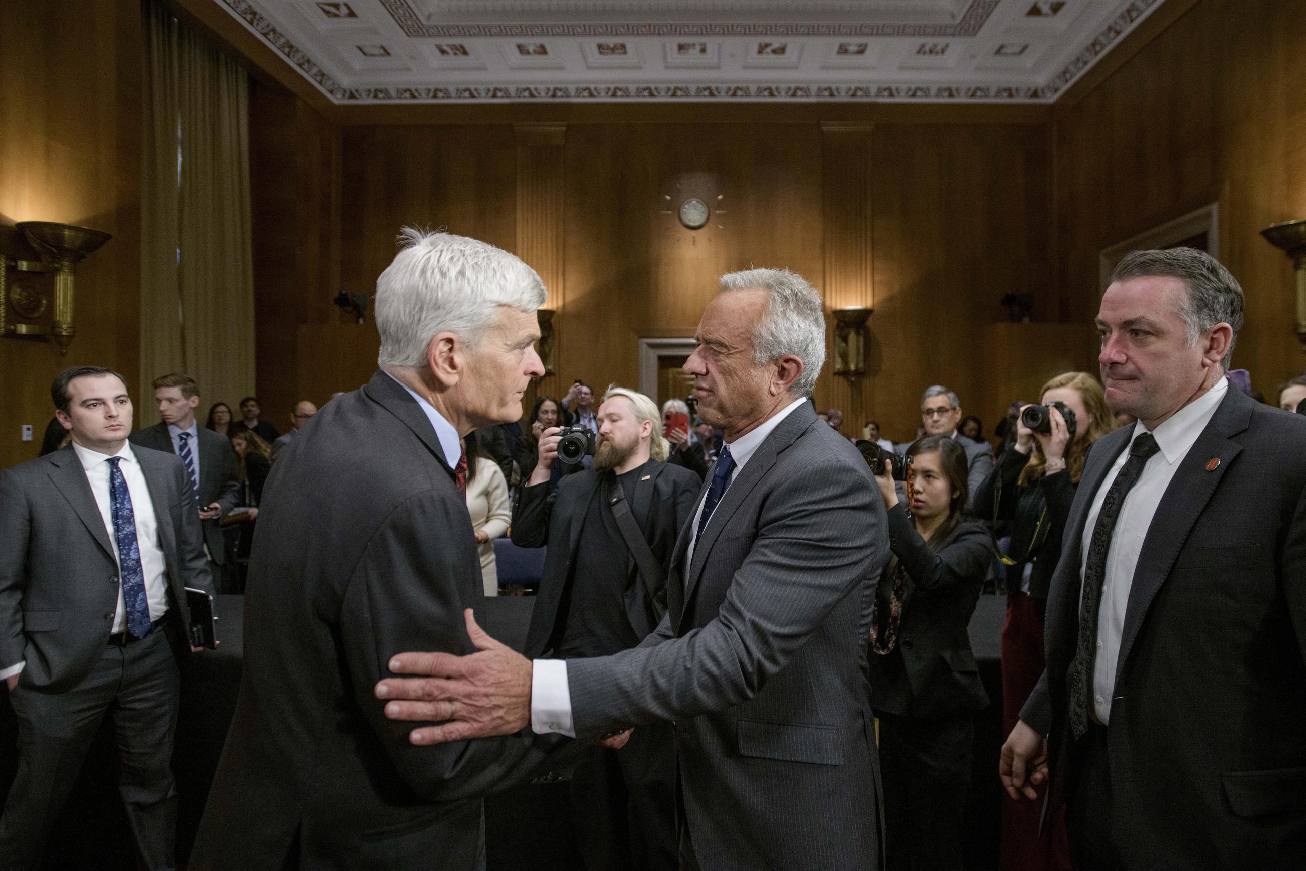 Sen. Bill Cassidy greets Robert F. Kennedy Jr. at his confirmation hearing to become HHS secretary. (AP Photo/Rod Lamkey, Jr.)