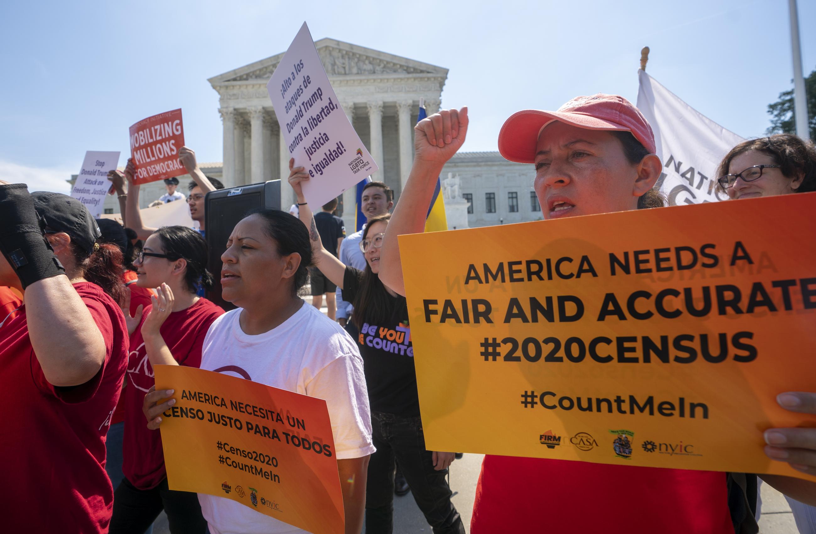 FILE - Demonstrators gather at the Supreme Court as the justices finish the term with key decisions on gerrymandering and a census case involving an attempt by the Trump administration to ask everyone about their citizenship status in the 2020 census, on Capitol Hill in Washington, June 27, 2019. (AP Photo/J. Scott Applewhite, file)