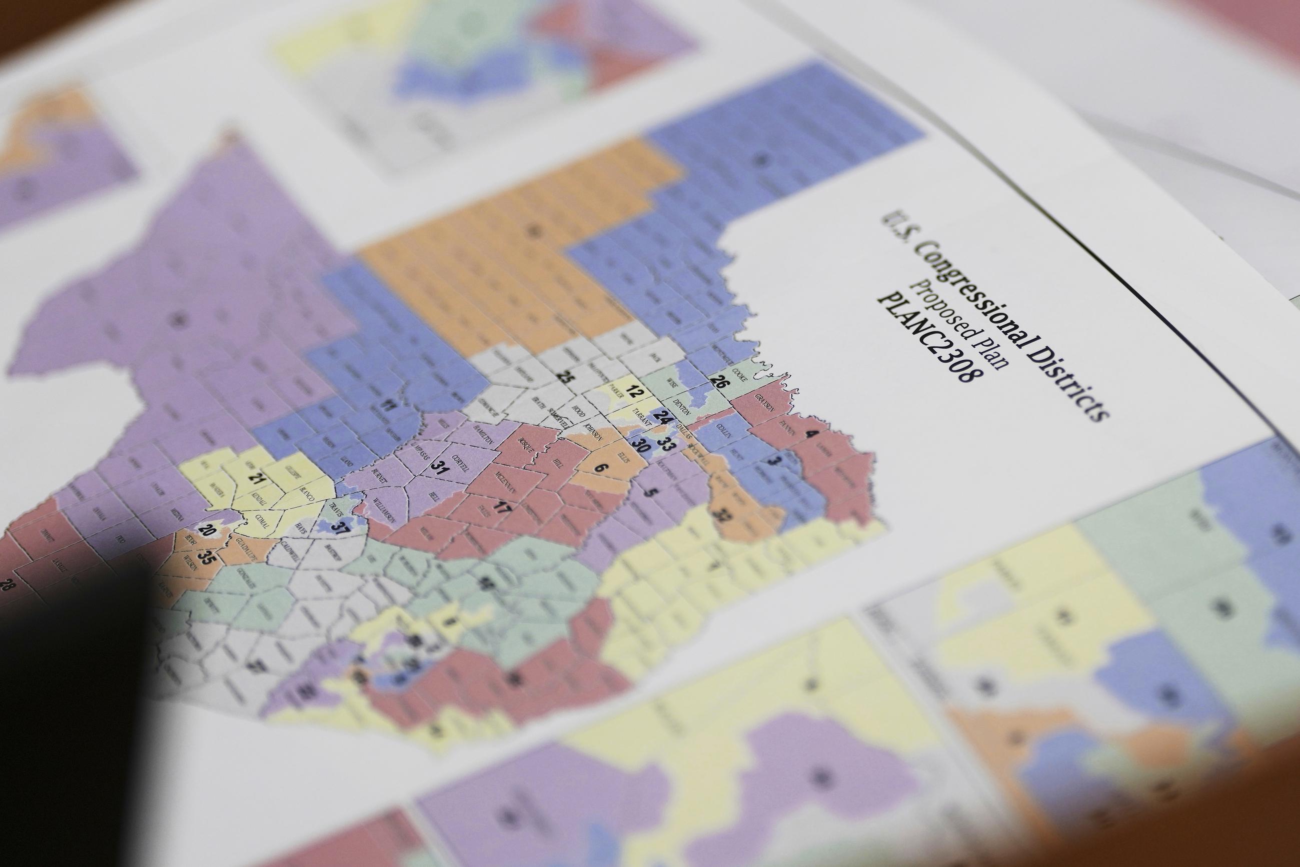 A proposed congressional map is seen at Texas legislators' public hearing on congressional redistricting in Austin on Aug. 1. (AP Photo/Eric Gay, file)