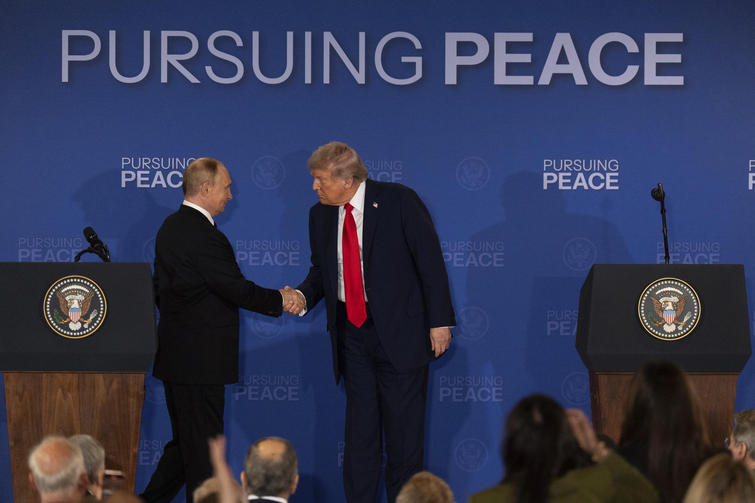President Trump and Russian President Vladimir Putin shake hands during a press conference at Joint Base Elmendorf-Richardson in Alaska on Aug. 15. (AP Photo/Jae C. Hong)