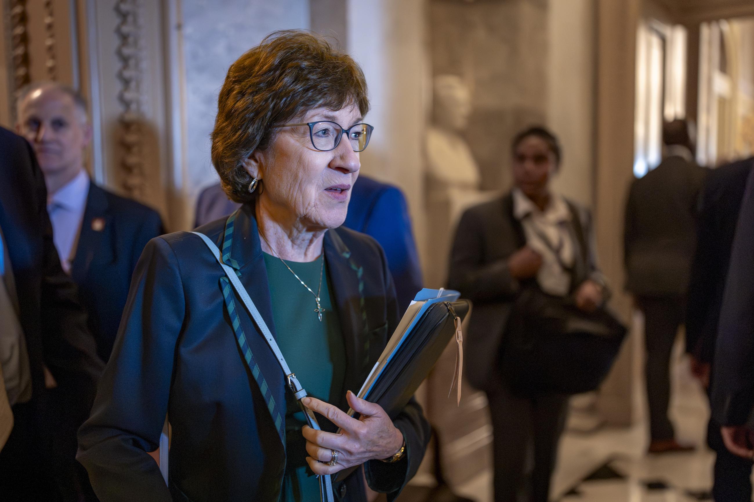 Sen. Susan Collins, R-Maine, departs the chamber as the Senate holds a procedural vote on the nomination of Emil Bove, who served on President Donald Trump's criminal defense team, to be a U.S. Circuit Court judge for the 3rd U.S. Circuit Court of Appeals, at the Capitol in Washington, Thursday, July 24, 2025. (AP Photo/J. Scott Applewhite)