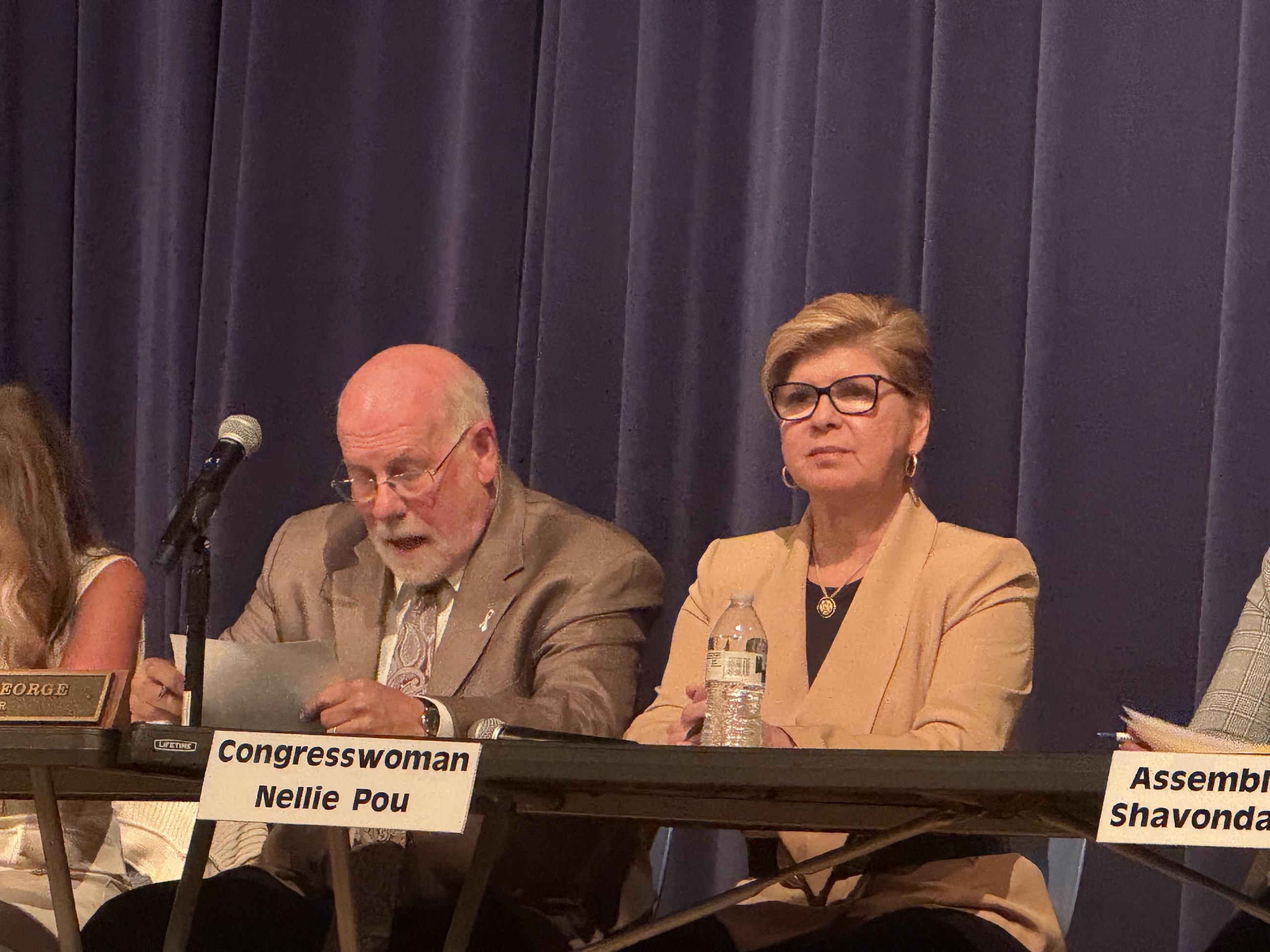 Rep. Nellie Pou, alongside North Haledon Mayor Randy George, at a borough council meeting in North Haledon, New Jersey, Aug. 20, 2025. (National Journal/Nicholas Anastácio)
