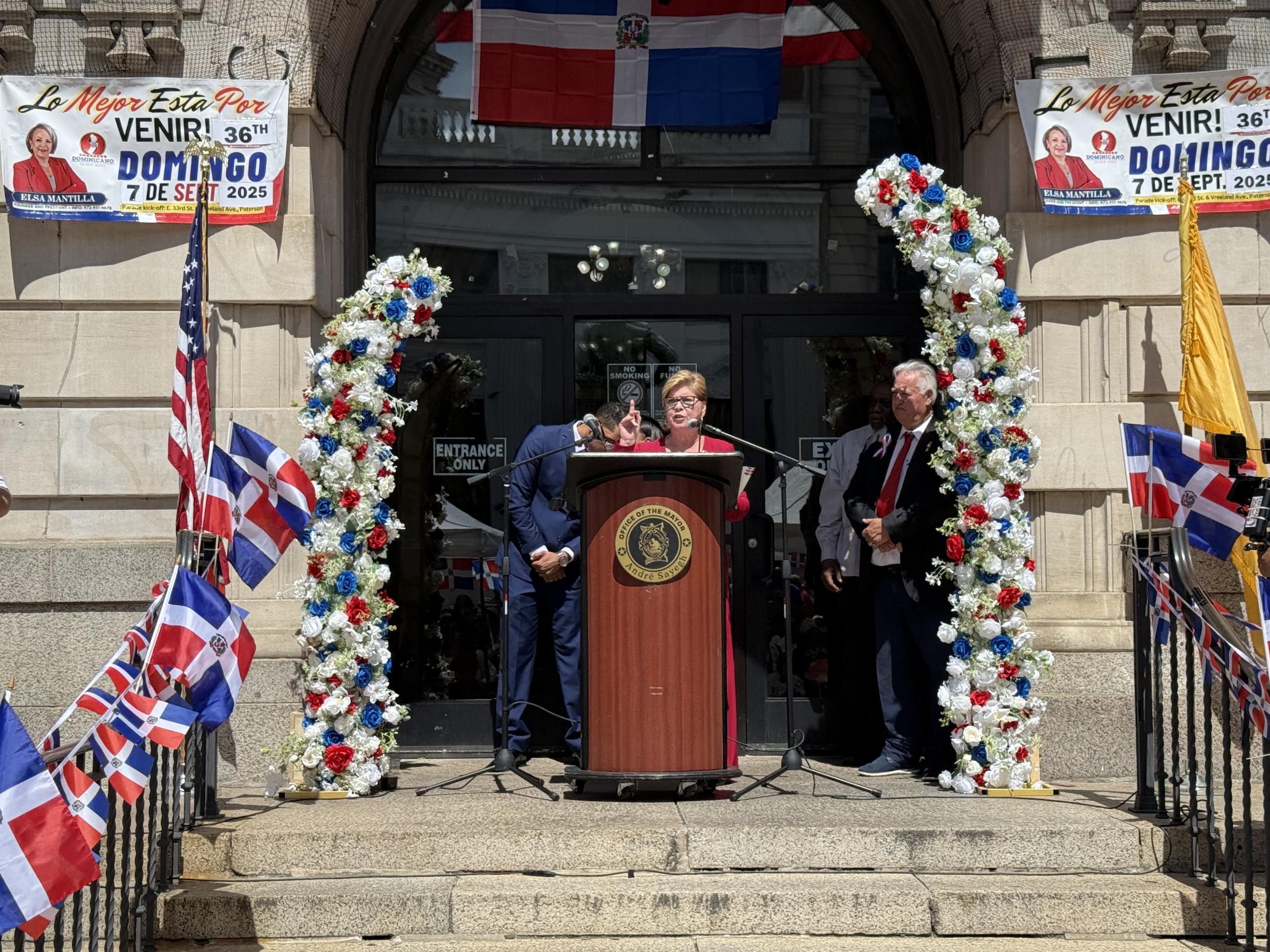 Rep. Nellie Pou speaks during a Dominican flag-raising ceremony in Paterson, New Jersey, on Aug. 30, 2025. (National Journal/Nicholas Anastácio)