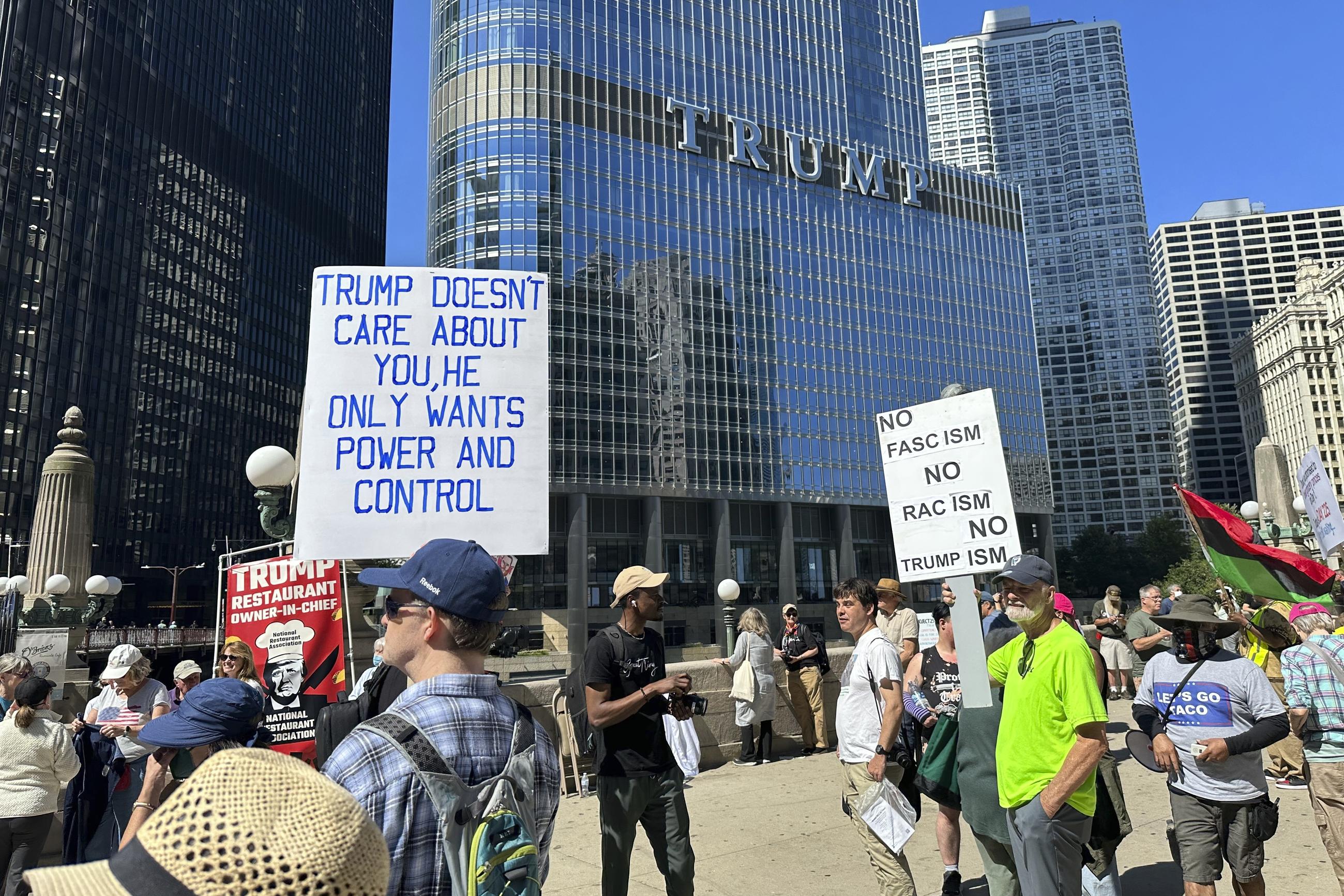 Protesters gather for a Labor Day rally in view of Trump Tower in Chicago on Sept. 1. (AP Photo/Melina Walling)