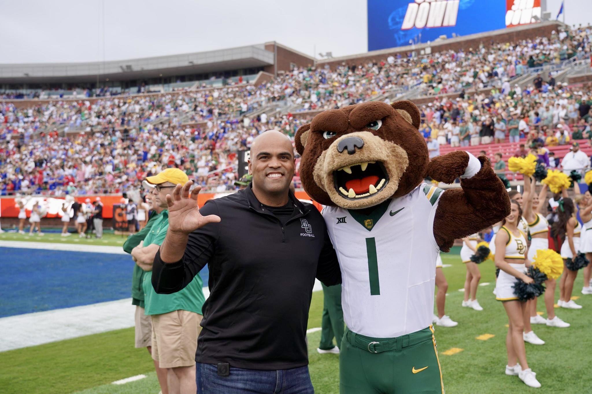 Former Rep. Colin Allred poses with Bruiser at Baylor University's season opener against SMU in Dallas on Sept. 6. (Colin Allred via X)