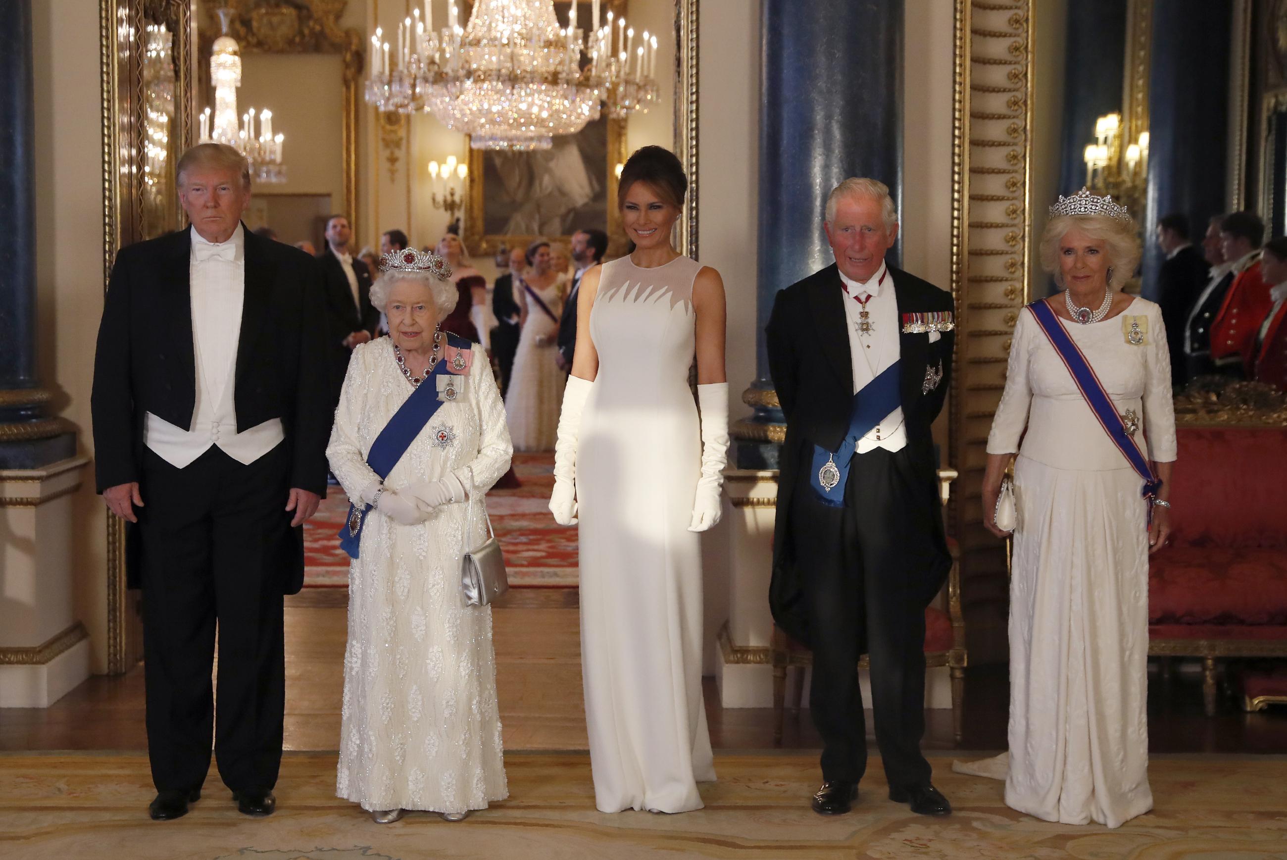 President Trump, Queen Elizabeth II, first lady Melania Trump, then-Prince Charles, and Camilla, then-duchess of Cornwall, pose at Buckingham Palace in 2019. (AP Photo/Alastair Grant)