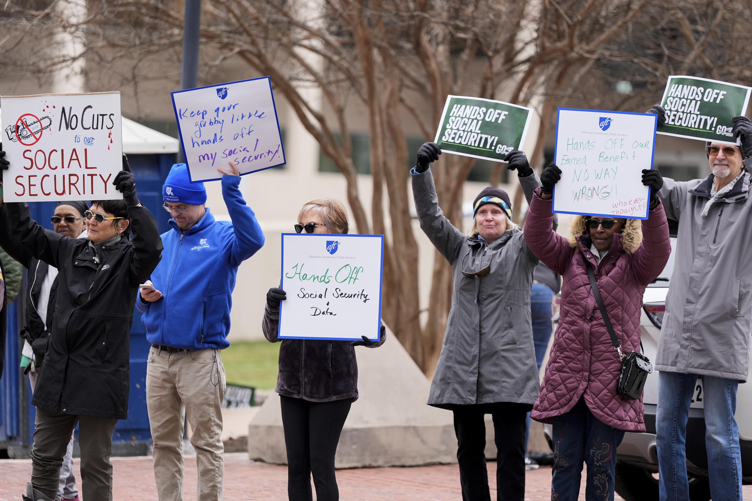 FILE - Demonstrators gather outside a courthouse in Baltimore in March before a hearing regarding the Department of Government Efficiency's access to Social Security data. (AP Photo/Stephanie Scarbrough, File)