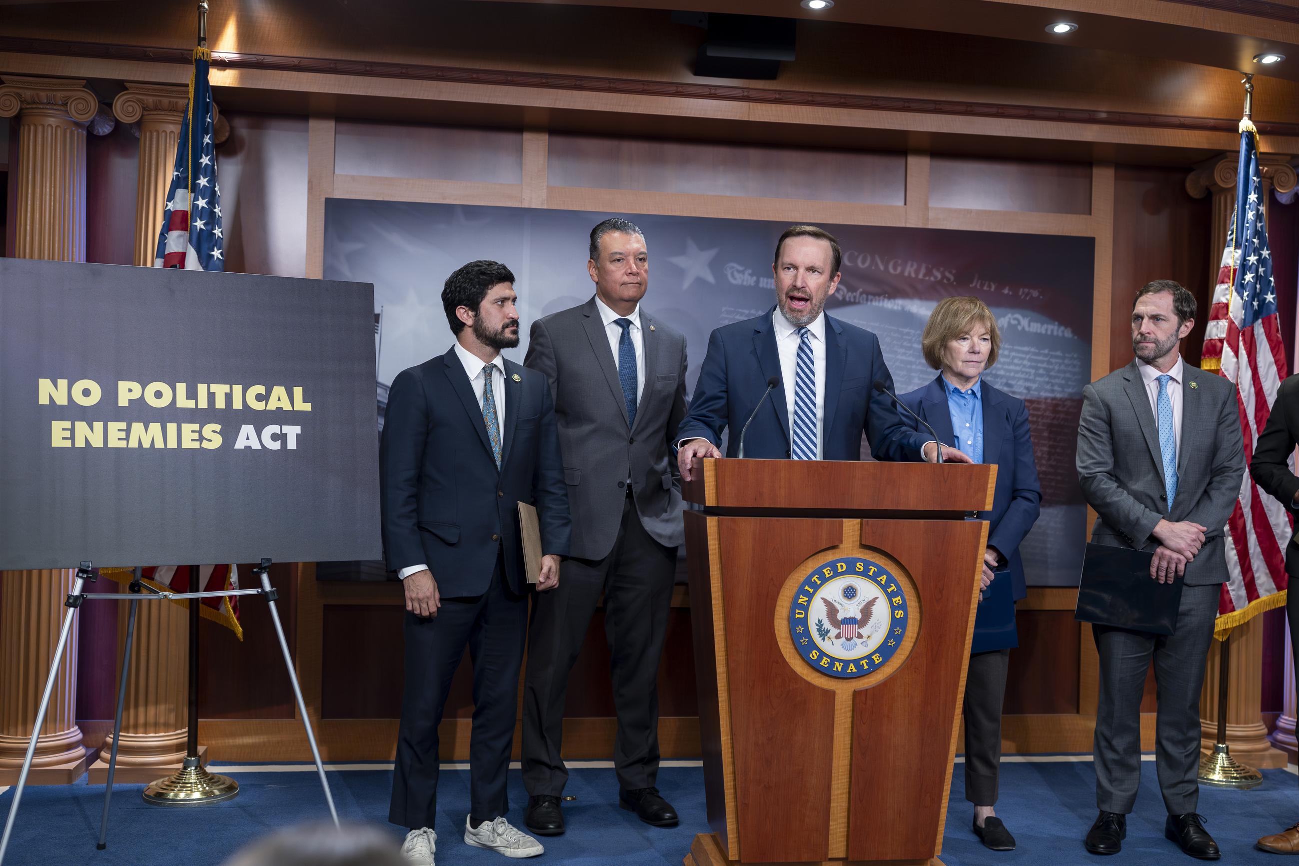 Sen. Chris Murphy (center) is joined from left by Rep. Greg Casar, Sen. Alex Padilla, Sen. Tina Smith, and Rep. Jason Crow to talk about freedom of speech at a news conference on Thursday. (AP Photo/J. Scott Applewhite)