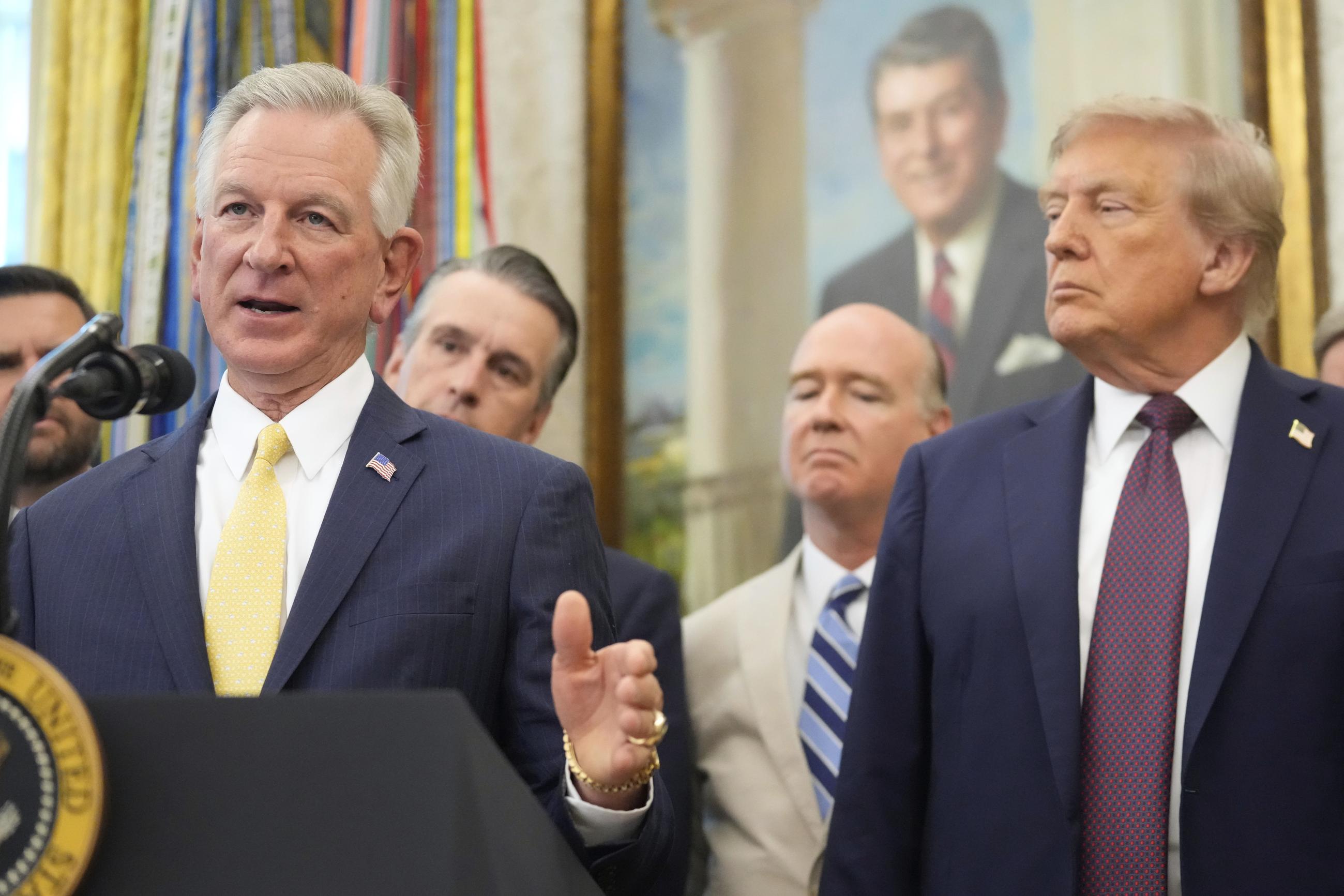 President Trump with Sen. Tommy Tuberville at an event in the Oval Office on Sept. 2 (AP Photo/Mark Schiefelbein)