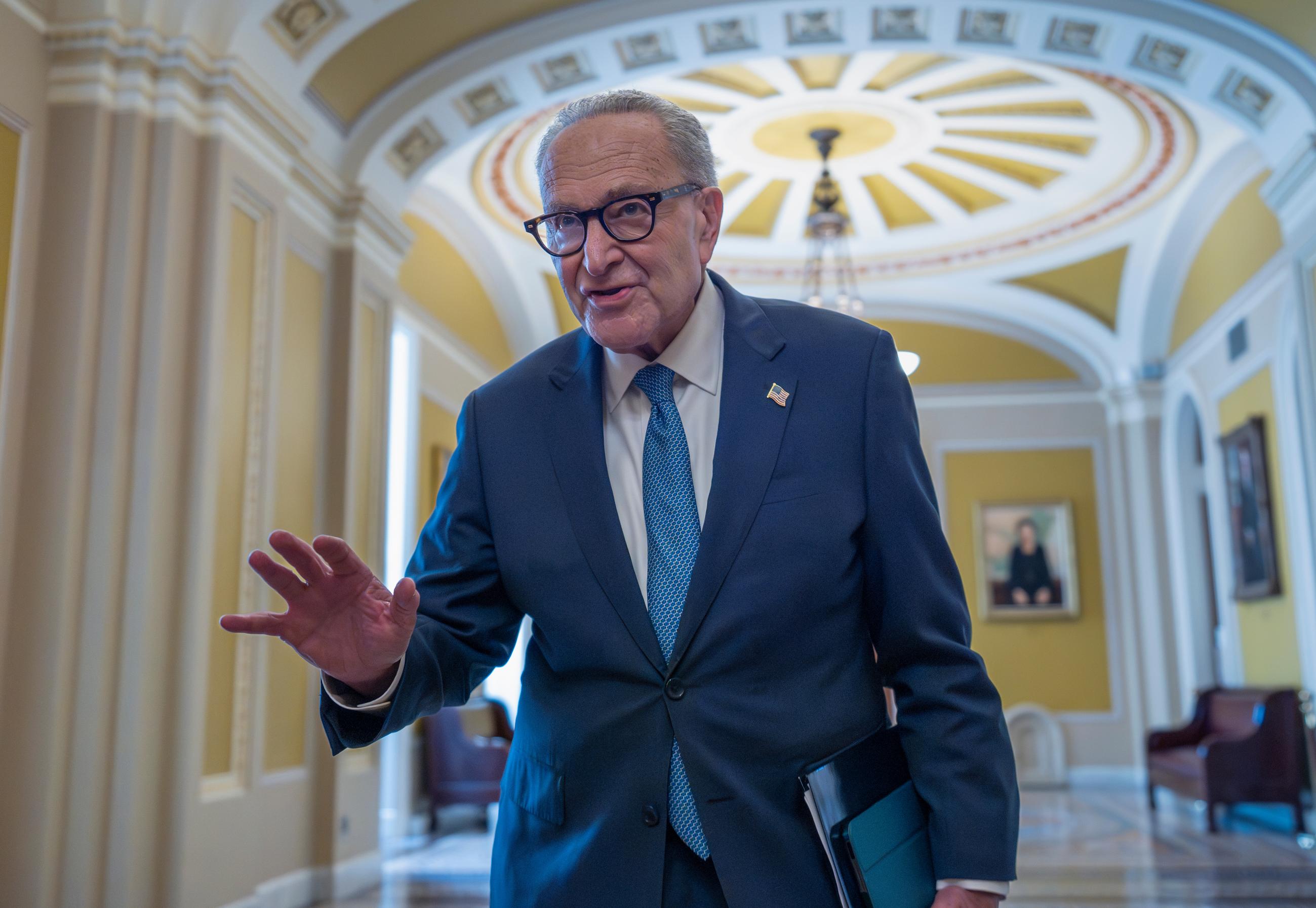 Senate Minority Leader Chuck Schumer, D-N.Y., talks to reporters as he departs for a meeting with President Donald Trump and the top four congressional leaders to discuss the government funding crisis, at the Capitol in Washington, Monday, Sept. 29, 2025. (AP Photo/J. Scott Applewhite)