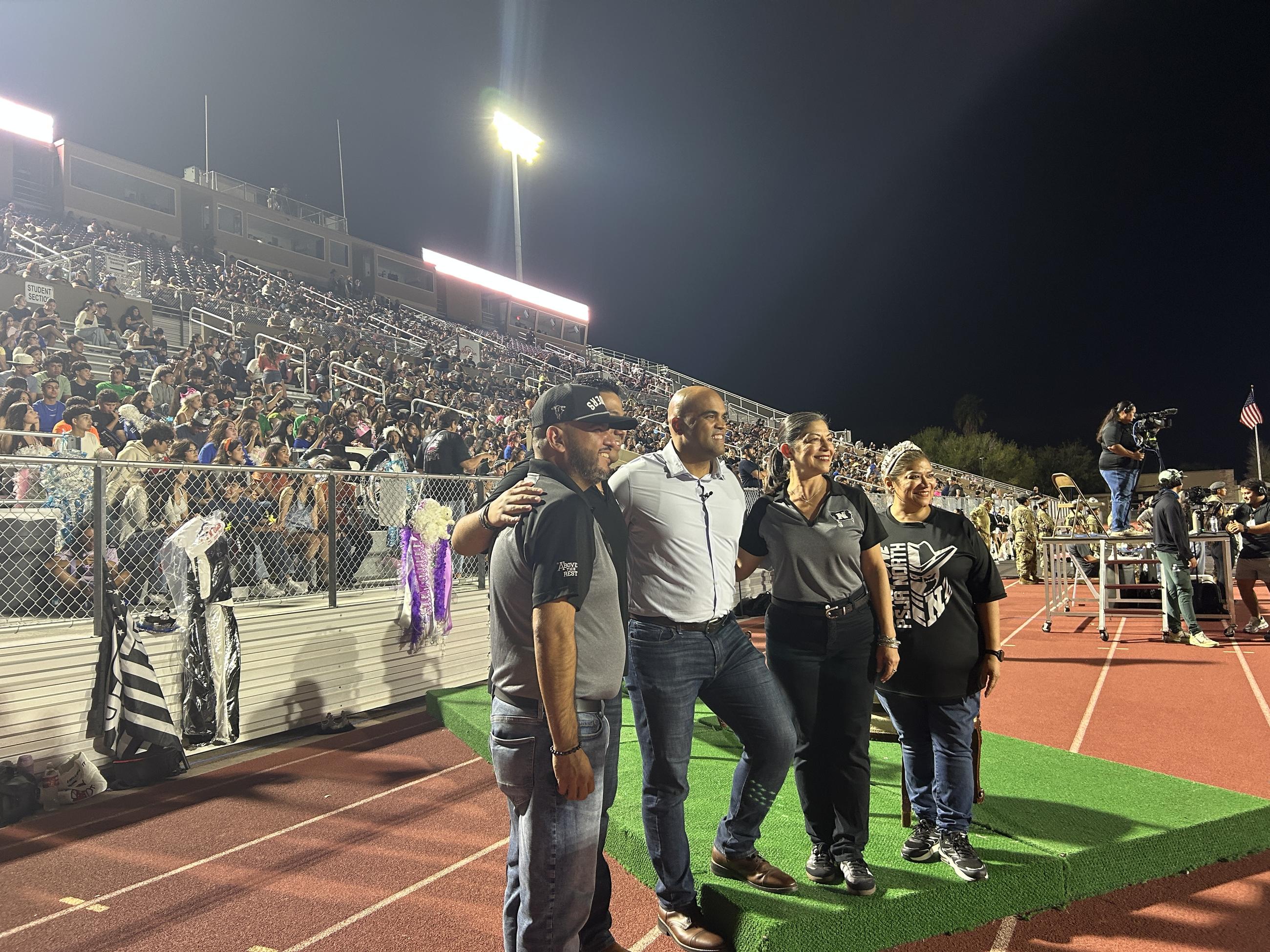 Allred takes photos with school employees at PSJA North on Oct. 3.