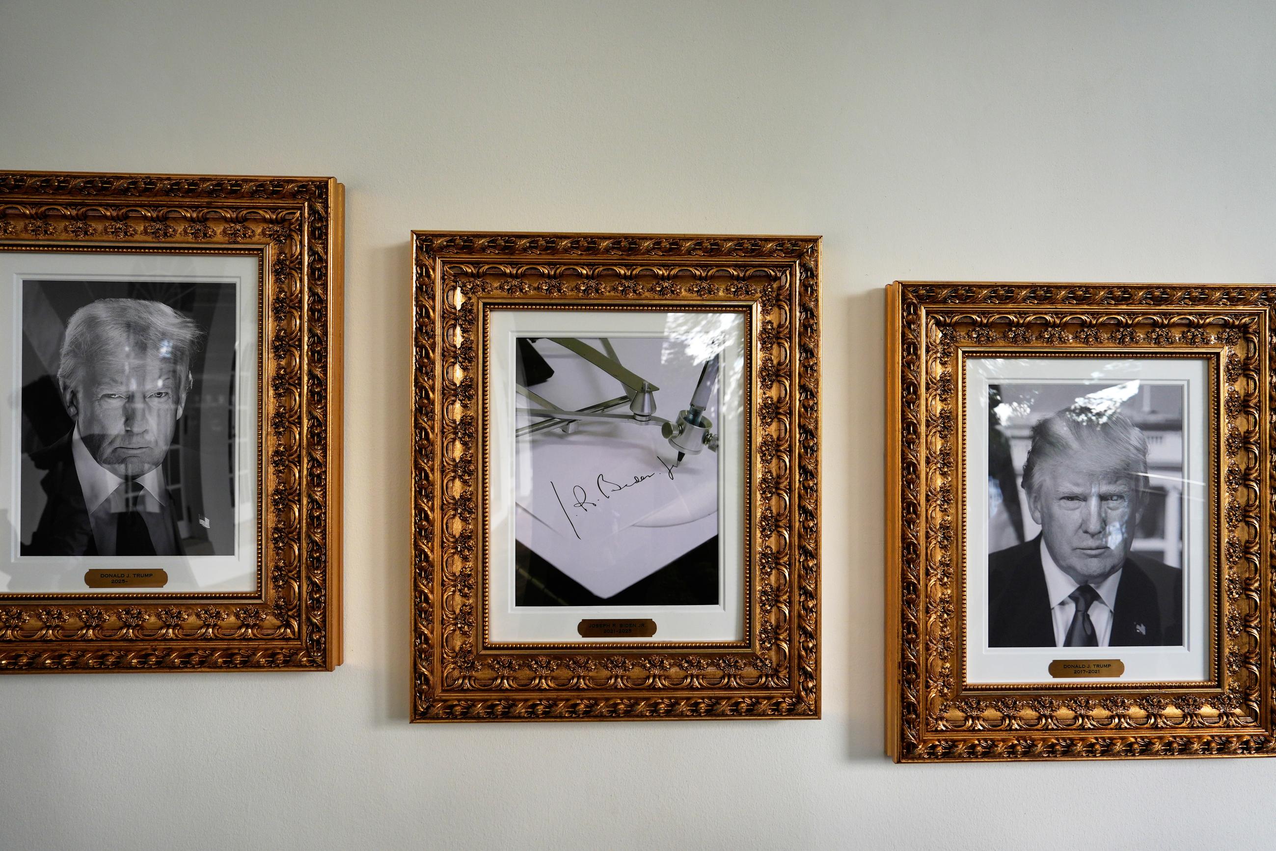 Framed images of President Trump, and former President Biden's autopen signature, appear on the Presidential Walk of Fame on the colonnade of the White House on Sept. 26. (AP Photo/Julia Demaree Nikhinson)