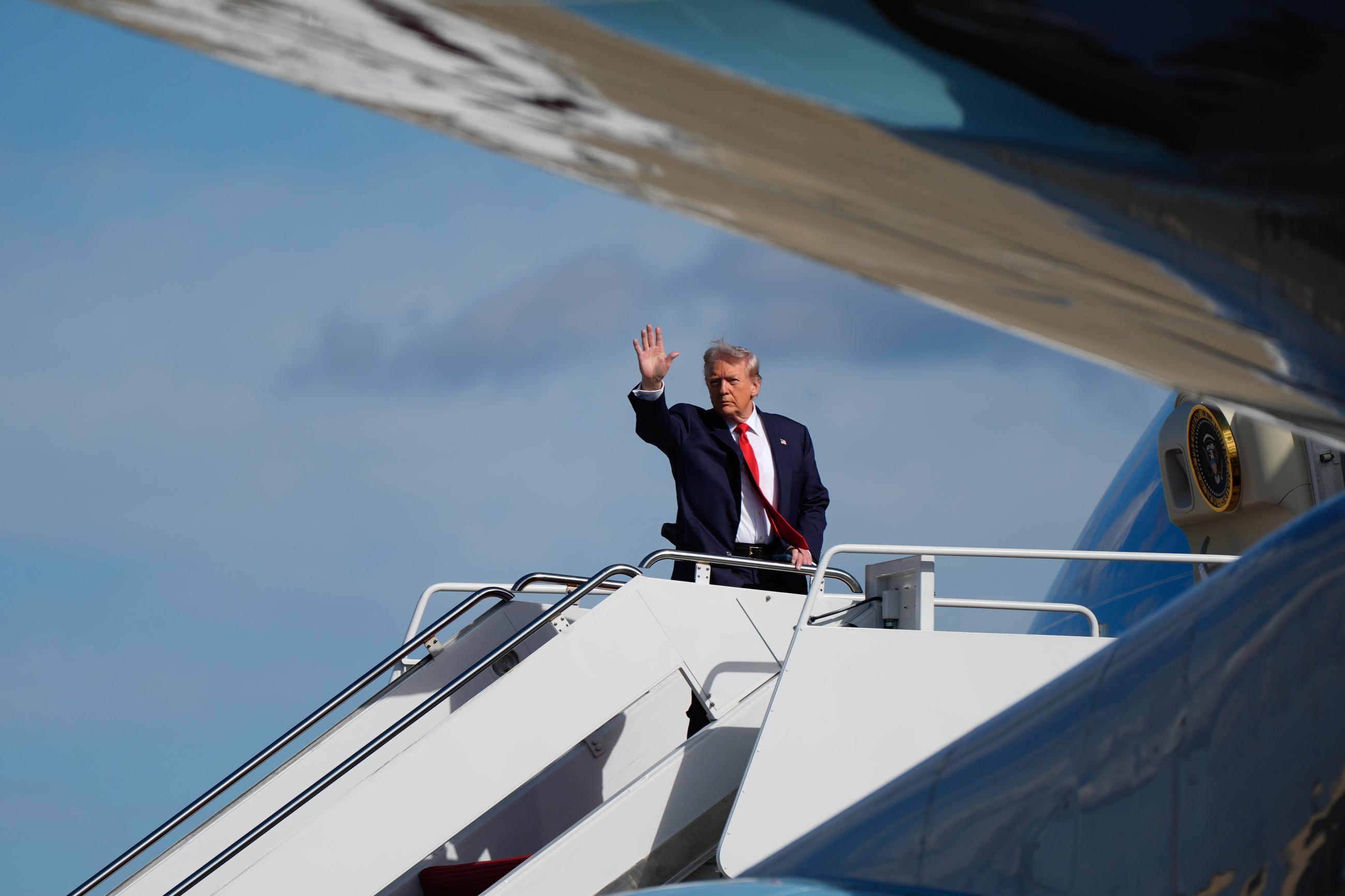 President Donald Trump waves as he boards Air Force One at Joint Base Andrews, Md., Friday, Oct. 31, 2025, enroute to Florida. AP Photo/Manuel Balce Ceneta)