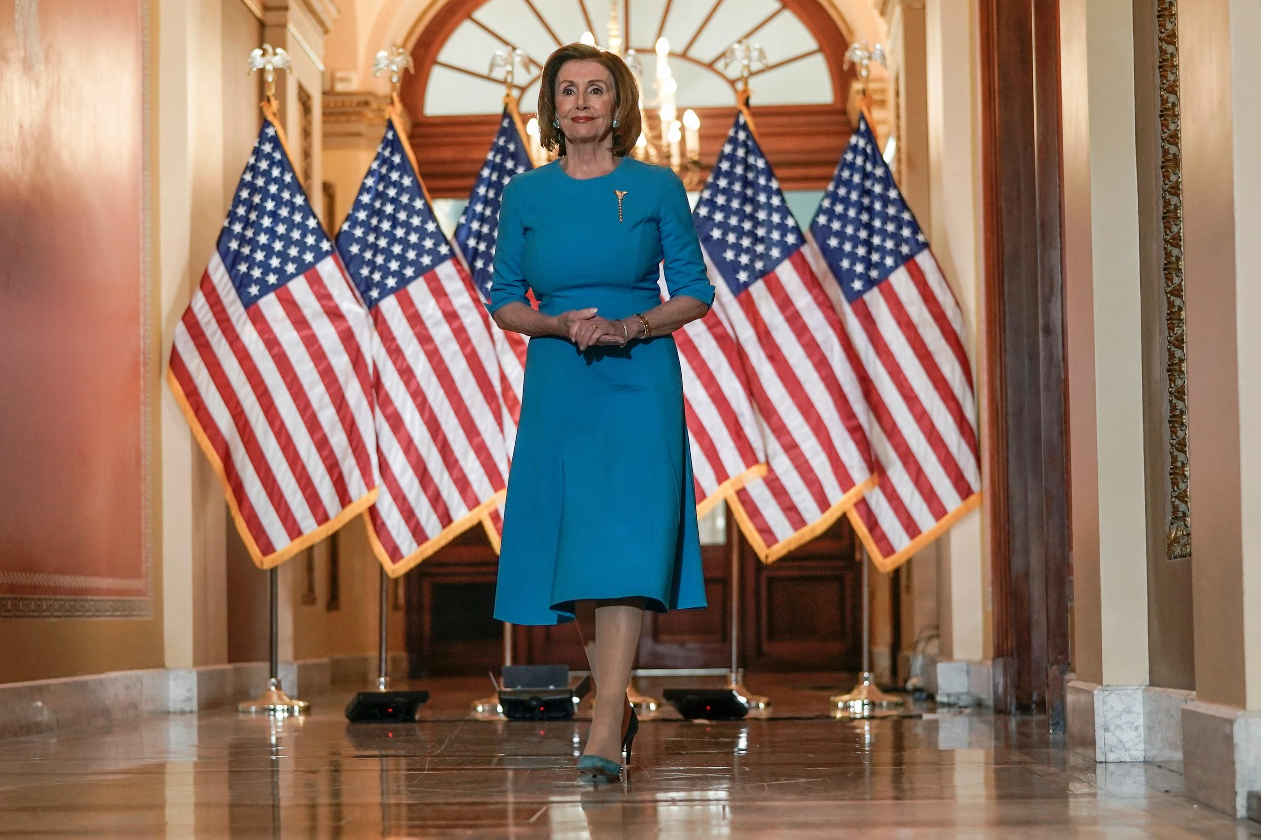 FILE - House Speaker Nancy Pelosi of Calif., arrives to speak about the House coronavirus bill on Capitol Hill in Washington, March, 13, 2020. (AP Photo/Scott Applewhite, File)
