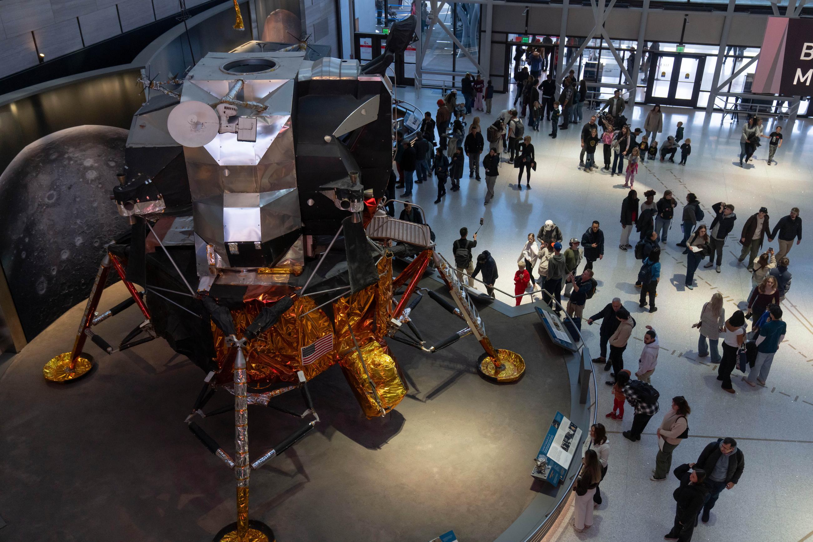 Visitors at the Smithsonian's National Air and Space Museum after it reopened on Nov. 14 following the government shutdown (AP Photo/Mark Schiefelbein)