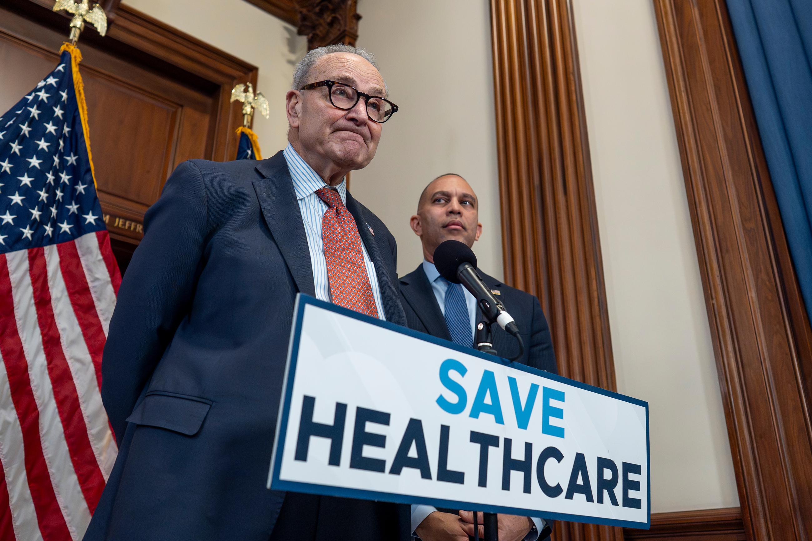 Senate Minority Leader Chuck Schumer and House Minority Leader Hakeem Jeffries meet with reporters to discuss health care affordability at the Capitol on Wednesday. (AP Photo/J. Scott Applewhite)