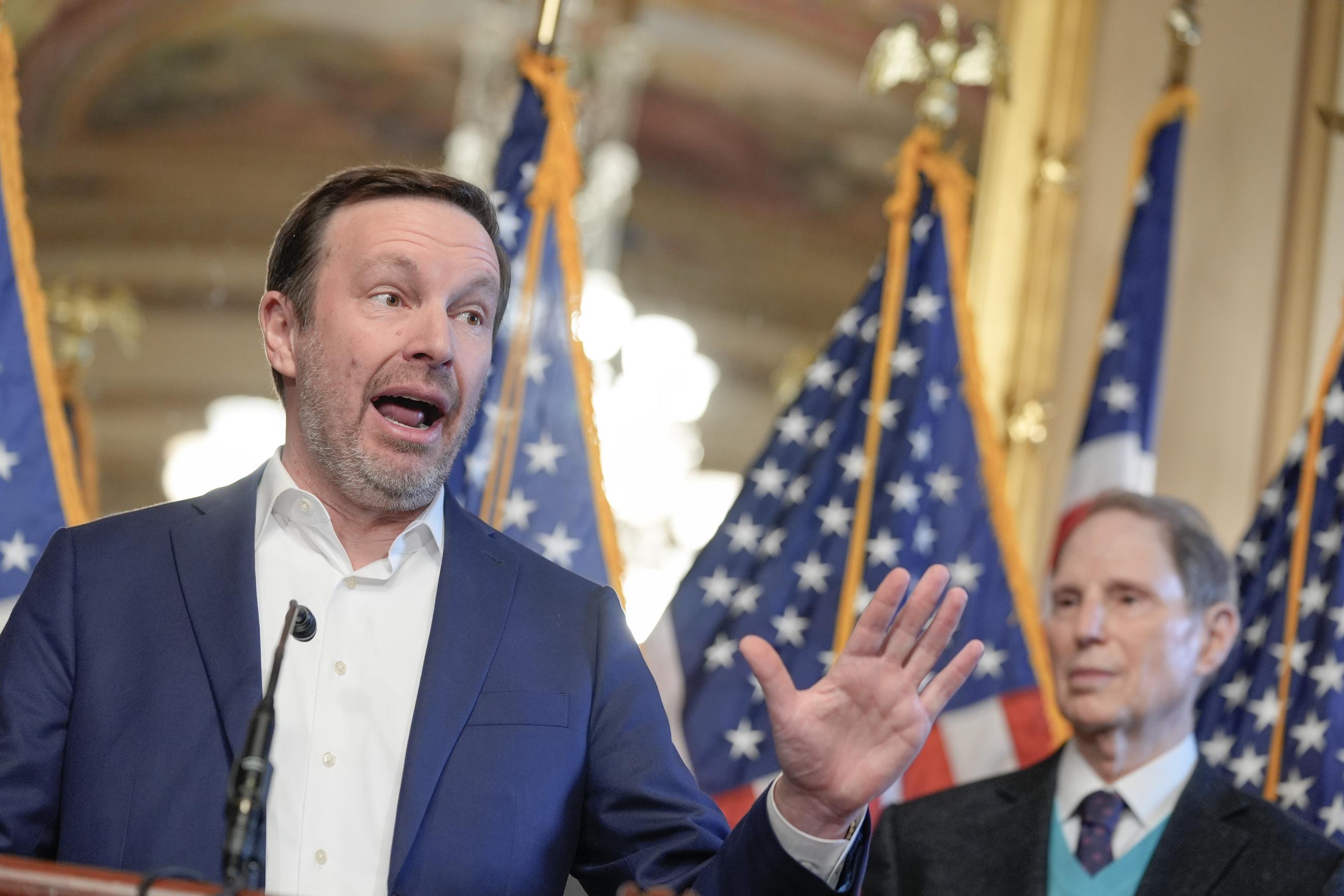 Sens. Chris Murphy and Ron Wyden at a news conference on health-insurance premiums Wednesday (AP Photo/Mariam Zuhaib)