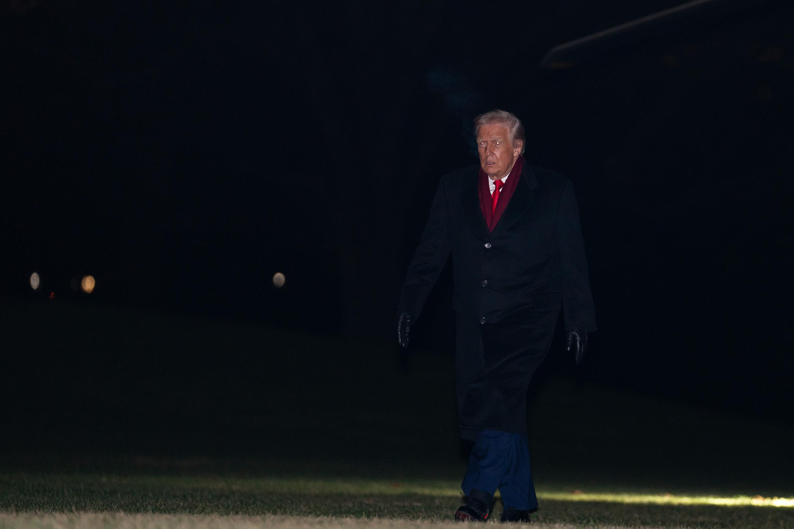 President Donald Trump returns to the White House following a political rally in Mount Pocono, Pa., Tuesday, Dec. 9, 2025, in Washington. (AP Photo/Allison Robbert)