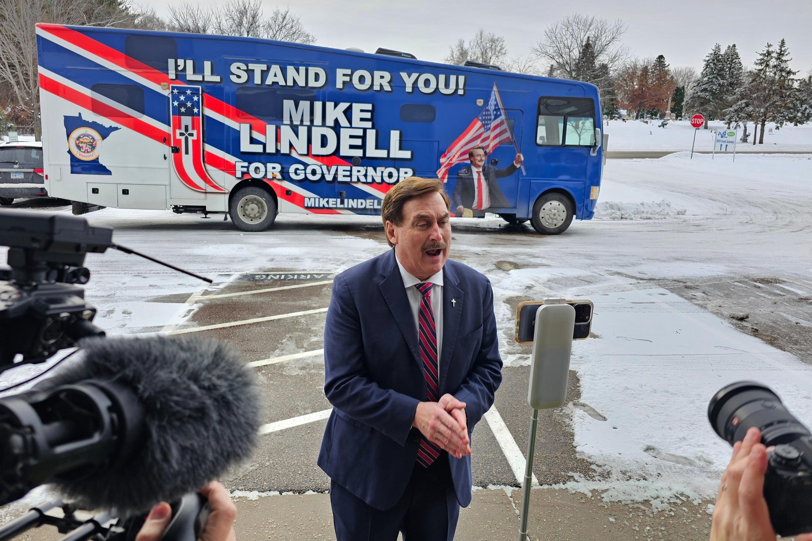 Mike Lindell speaks to reporters at his MyPillow factory in the Minneapolis suburb of Shakopee, Minn., on Dec, 11, as he launches his campaign for Minnesota governor. (AP Photo/Steve Karnowski)