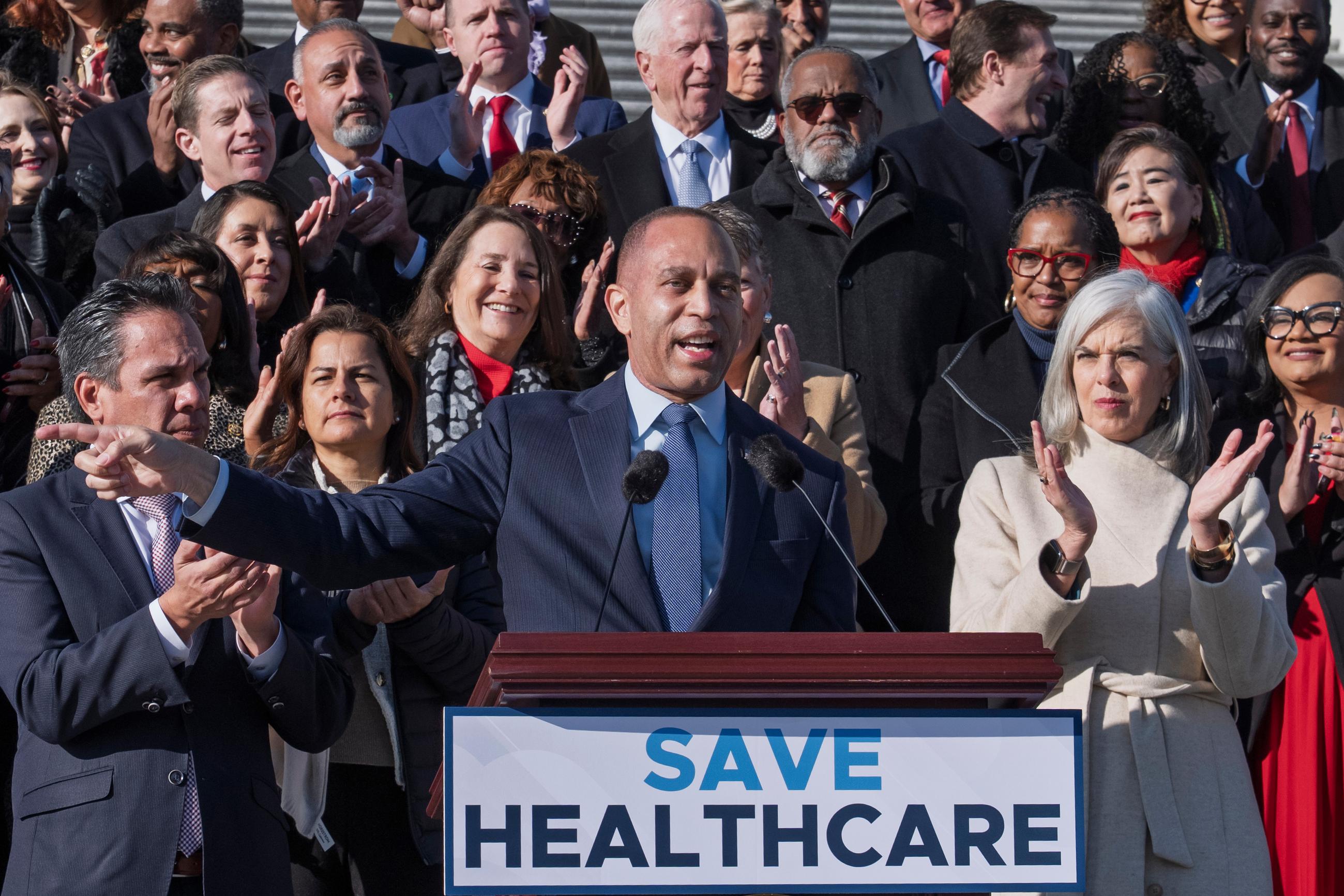 House Minority Leader Hakeem Jeffries, joined by the Democratic Caucus, speaks to reporters as they call for a vote on an extension of Affordable Care Act subsidies at the Capitol on Dec. 18. (AP Photo/J. Scott Applewhite)