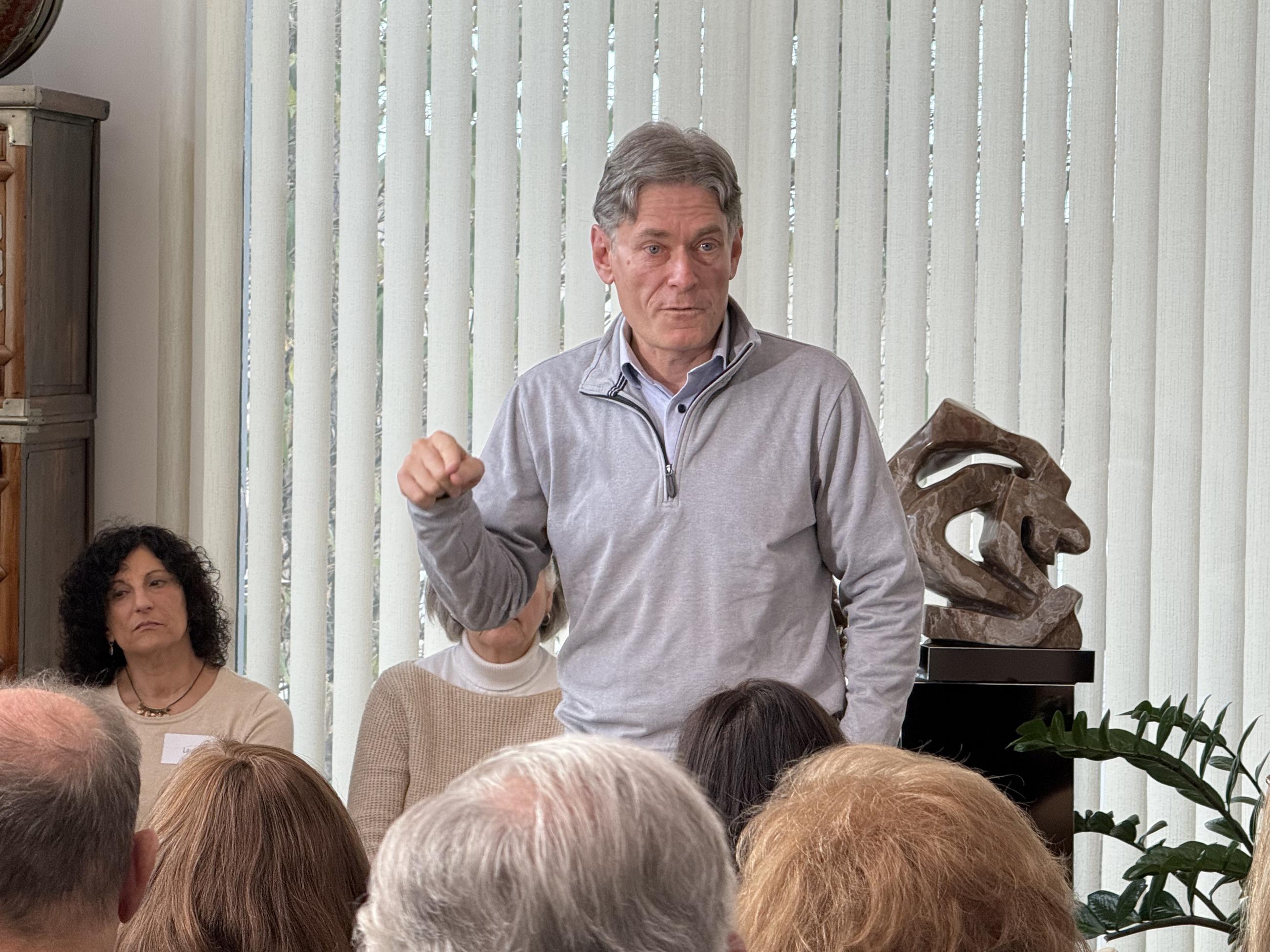 Former Rep. Tom Malinowski speaks to voters at a meet-and-greet event on Jan. 4 in Livingston, N.J. (National Journal/Nicholas Anastácio)
