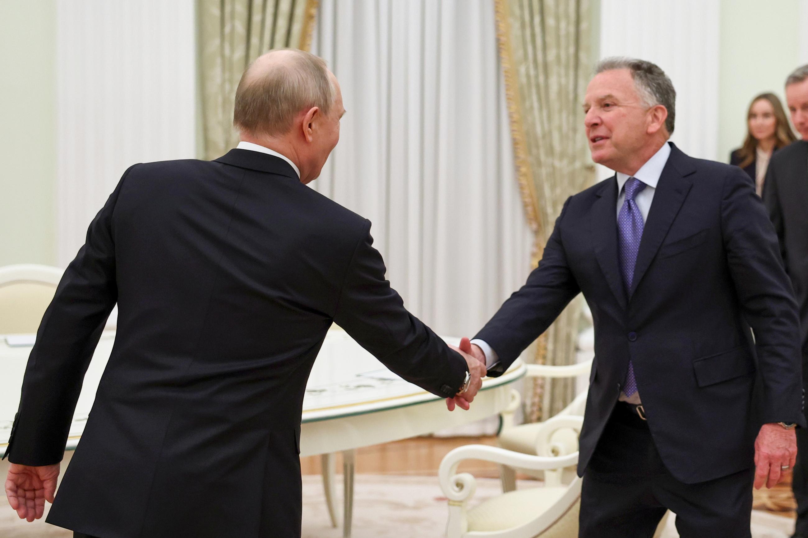 Russian President Vladimir Putin greets U.S. envoy Steve Witkoff at the Senate Palace of the Kremlin in Moscow on Jan. 22. (Alexander Kazakov/Sputnik, Kremlin Pool Photo via AP)
