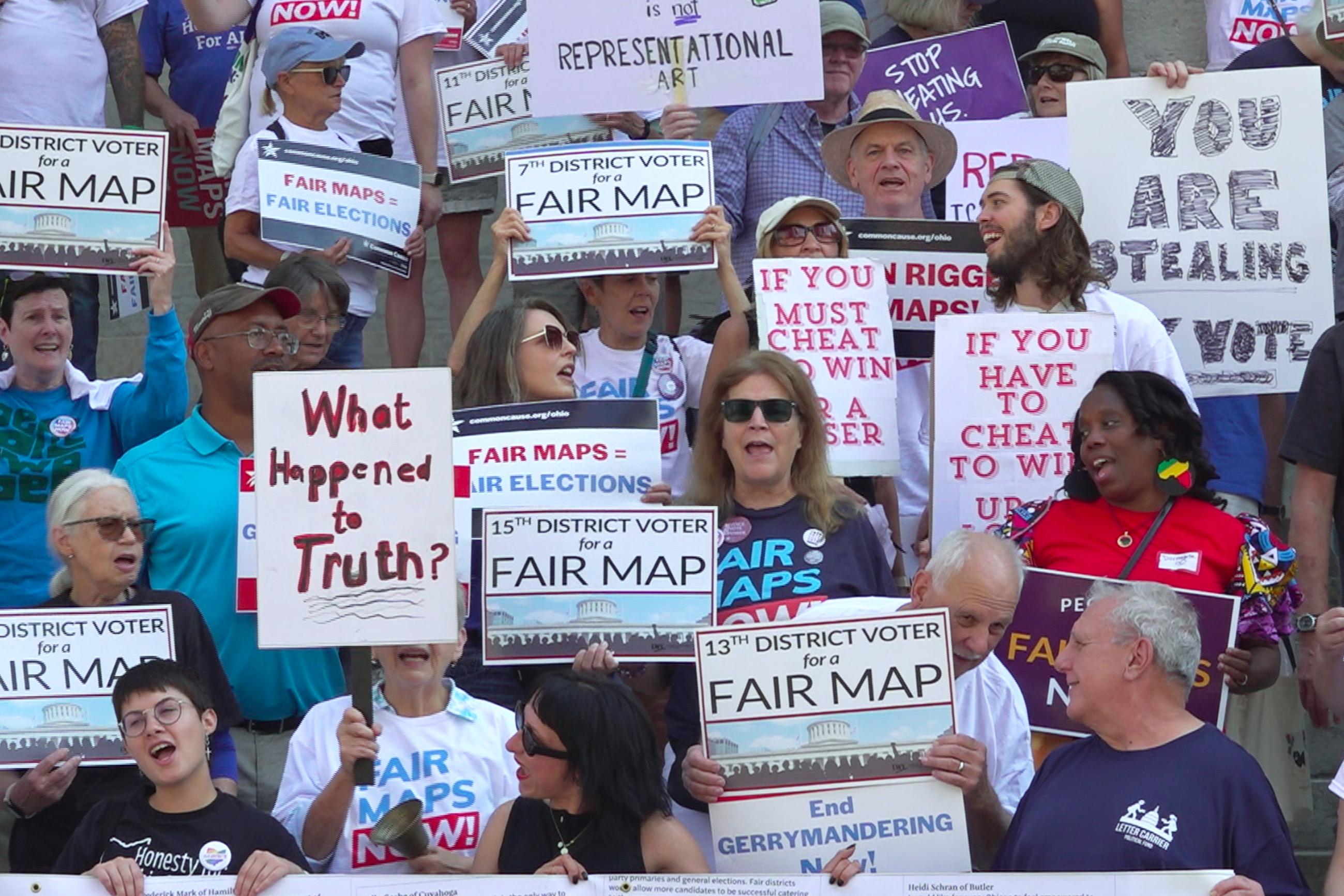 FILE - This photo taken from video shows organizers rallying outside of the Ohio statehouse in Columbus in September 2025 to protest gerrymandering and advocate for lawmakers to draw fair maps. (AP Photo/Patrick Aftoora-Orsagos, File)