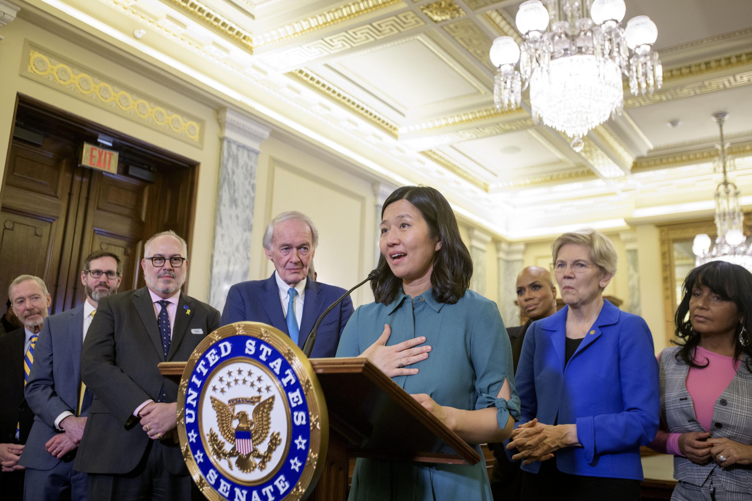 Boston Mayor Michelle Wu, center, is joined by Sen. Ed Markey, D-Mass., left and Sen. Elizabeth Warren, D-Mass., right, as she speaks during a Massachusetts Congressional Delegation press conference regarding the impacts of the Trump administration's actions on communities across Massachusetts, Tuesday, March 4, 2025, in Washington. (AP Photo/Rod Lamkey, Jr.)