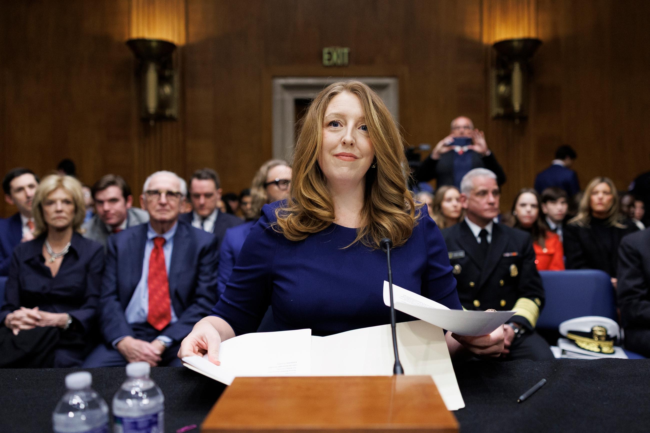 Surgeon-general nominee Casey Means takes her seat at the start of a Senate Health, Education, Labor, and Pensions Committee confirmation hearing on Wednesday. (AP Photo/Tom Brenner)