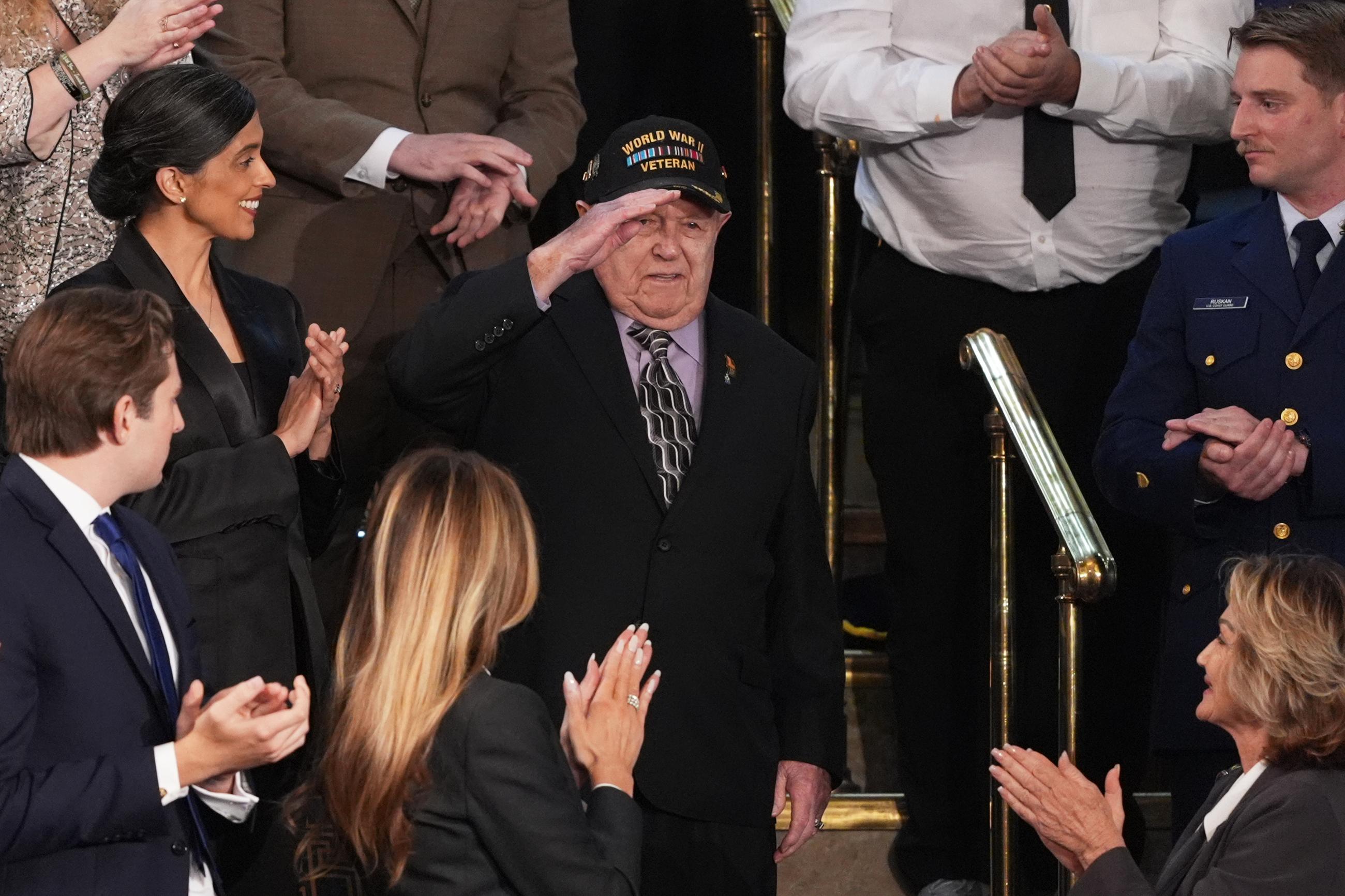 Retired U.S. Navy Capt. George "Buddy" Taggart is recognized for his service during Trump's State of the Union address. (AP Photo/J. Scott Applewhite)