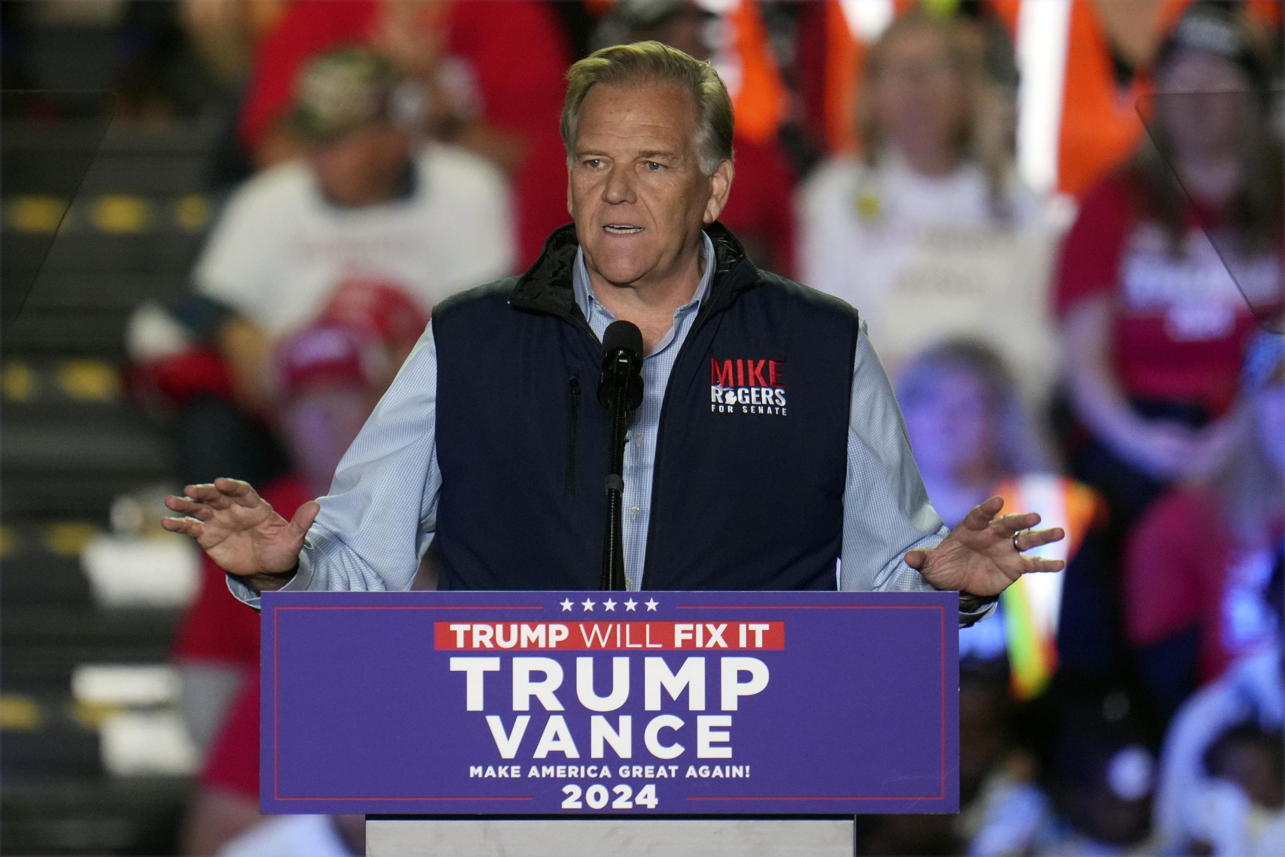 Former Rep. Mike Rogers campaigning for Donald Trump in Warren, Mich., in 2024 (AP Photo/Paul Sancya)