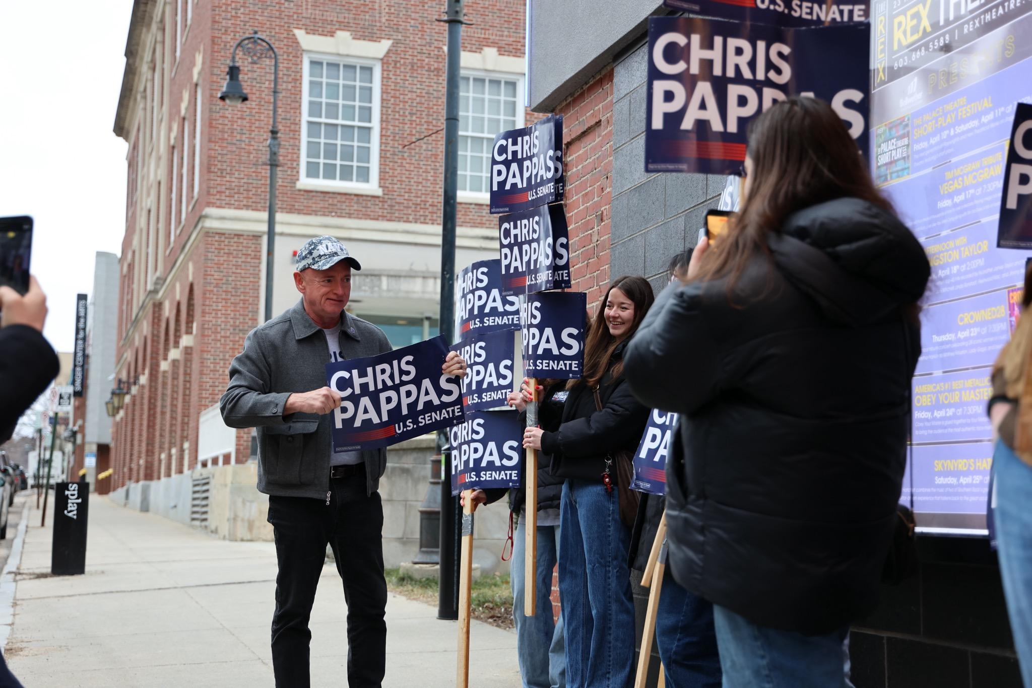 Sen. Mark Kelly of Arizona campaigns for Senate hopeful Chris Pappas in Manchester, N.H., on March 17.