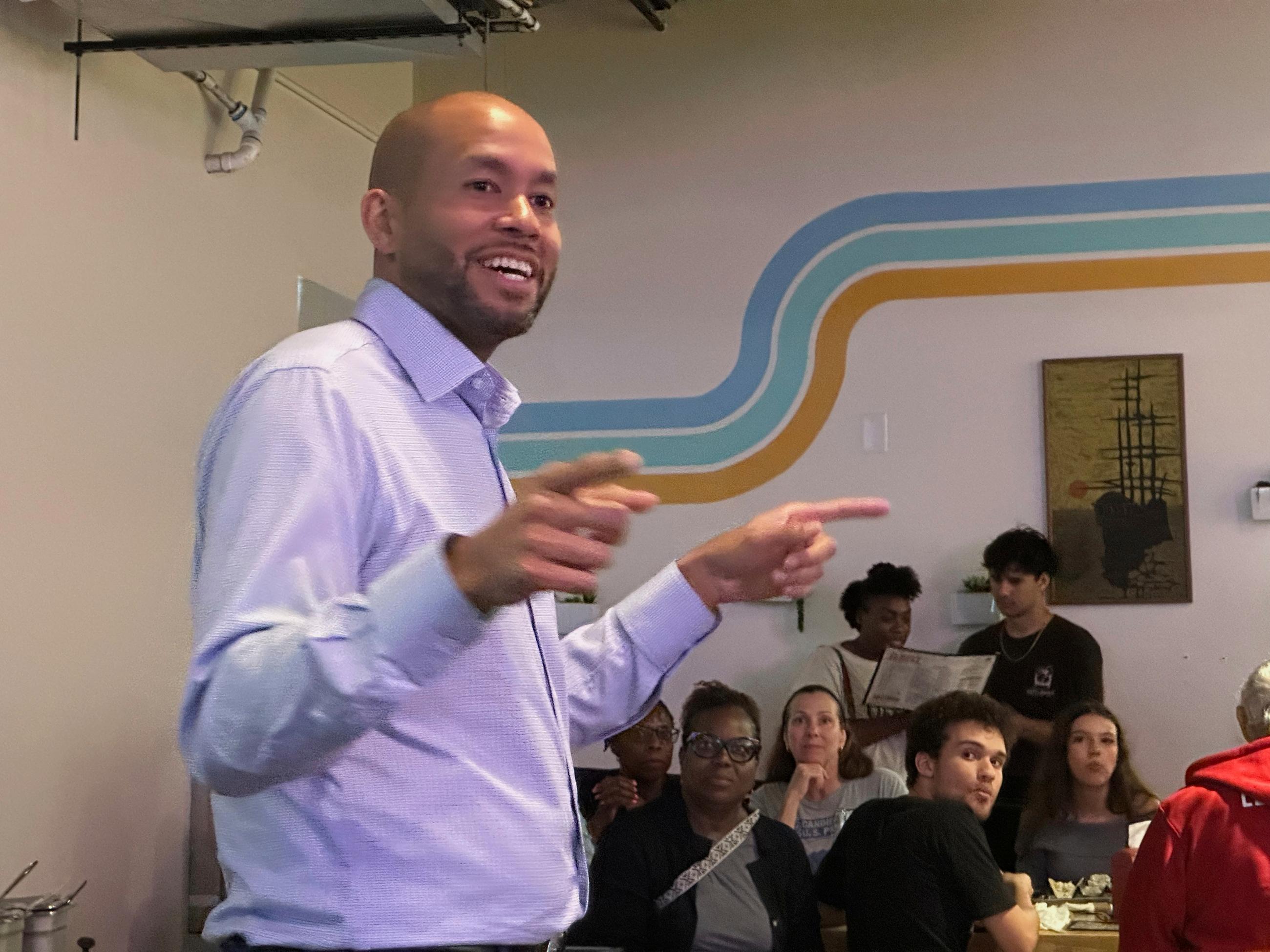 Democrat Jason Esteves speaks during a campaign event on Wednesday, Aug. 13, 2025, in Columbus, Ga. (AP Photo/Jeff Amy)