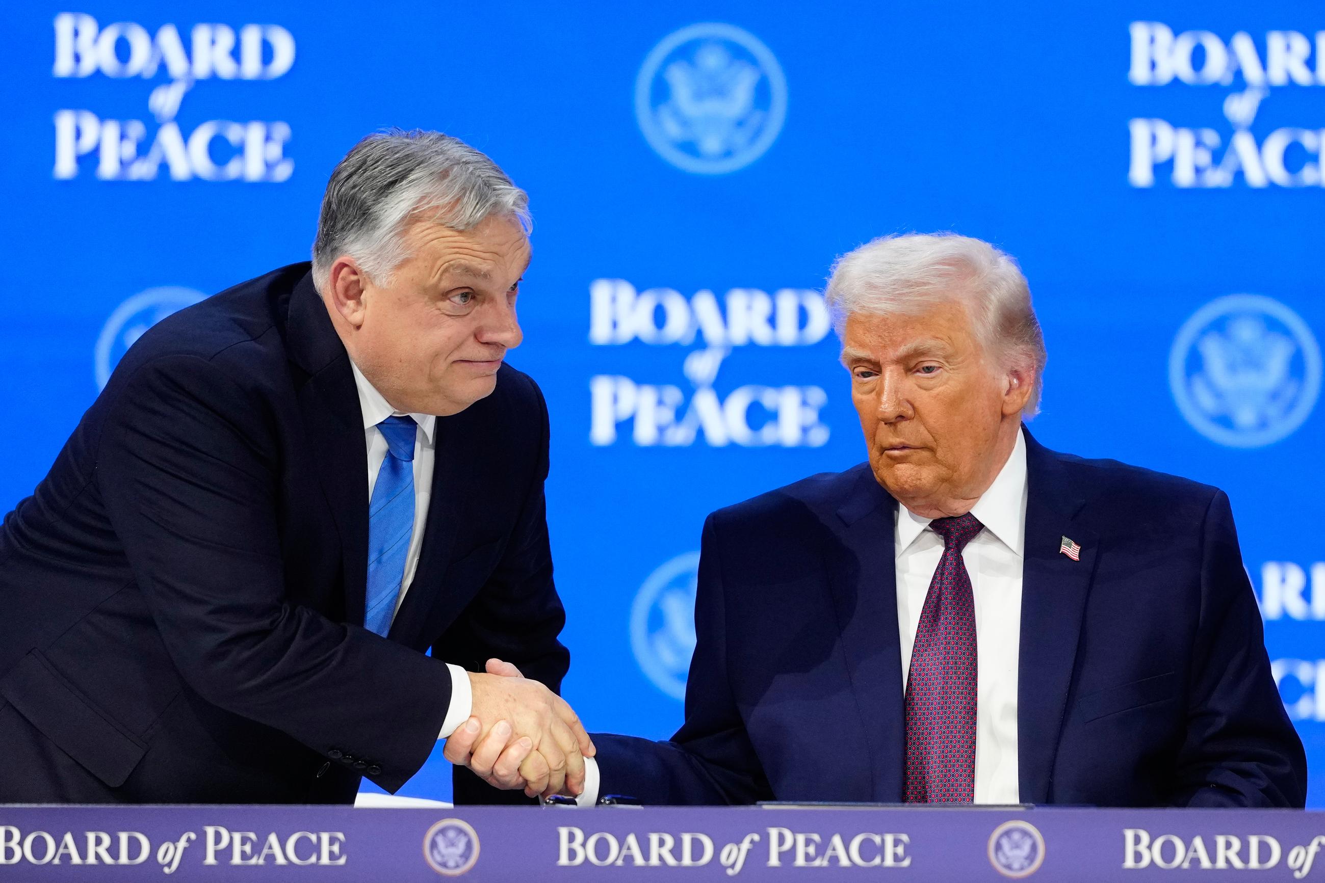 President Trump shakes hands with Hungarian Prime Minister Viktor Orbán in Davos, Switzerland, on Jan. 22. (AP Photo/Markus Schreiber, File)