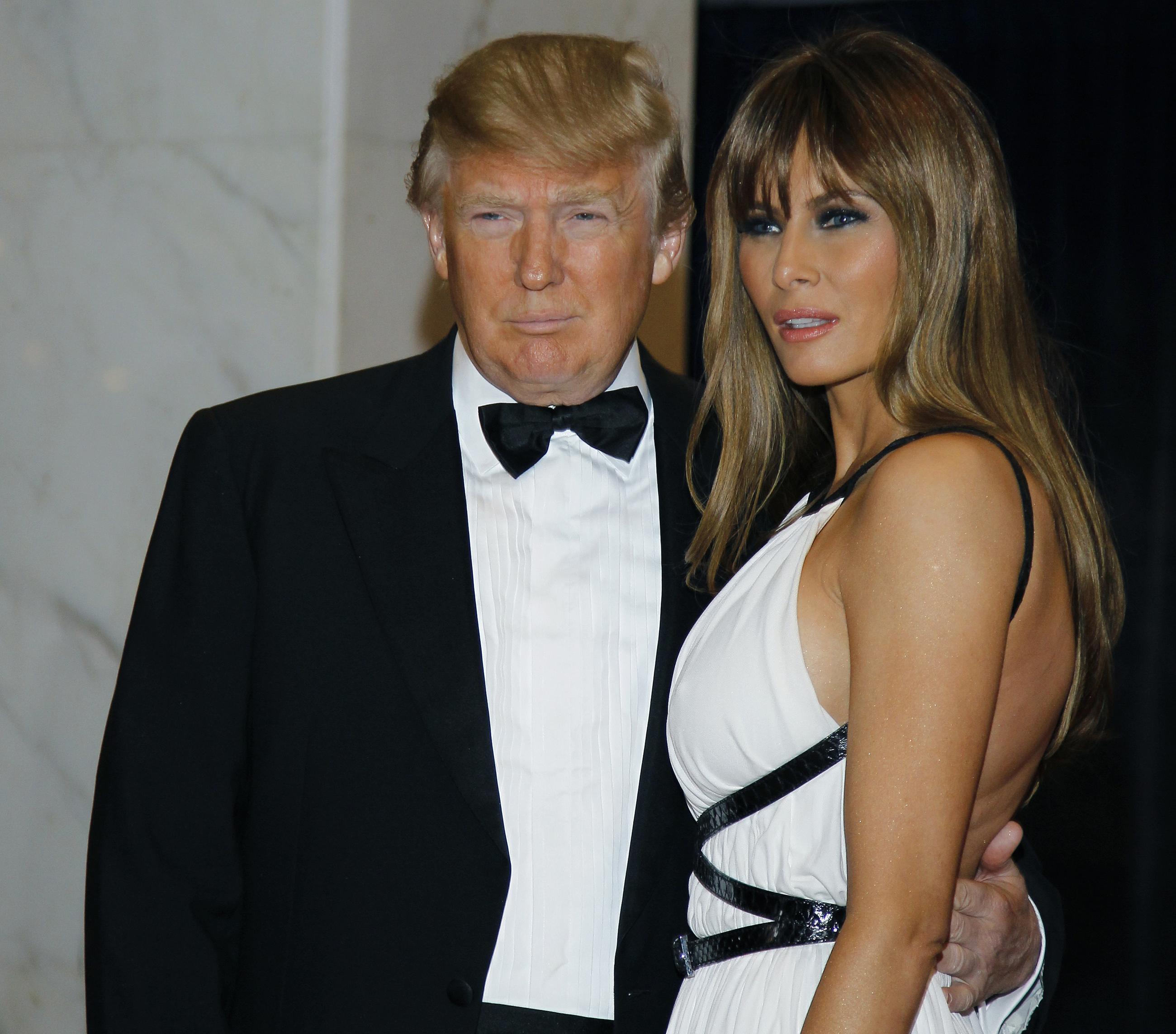 In this April 30, 2011, file photo, Donald and Melania Trump arrive for the White House Correspondents' Dinner in Washington. (AP Photo/Alex Brandon, File)
