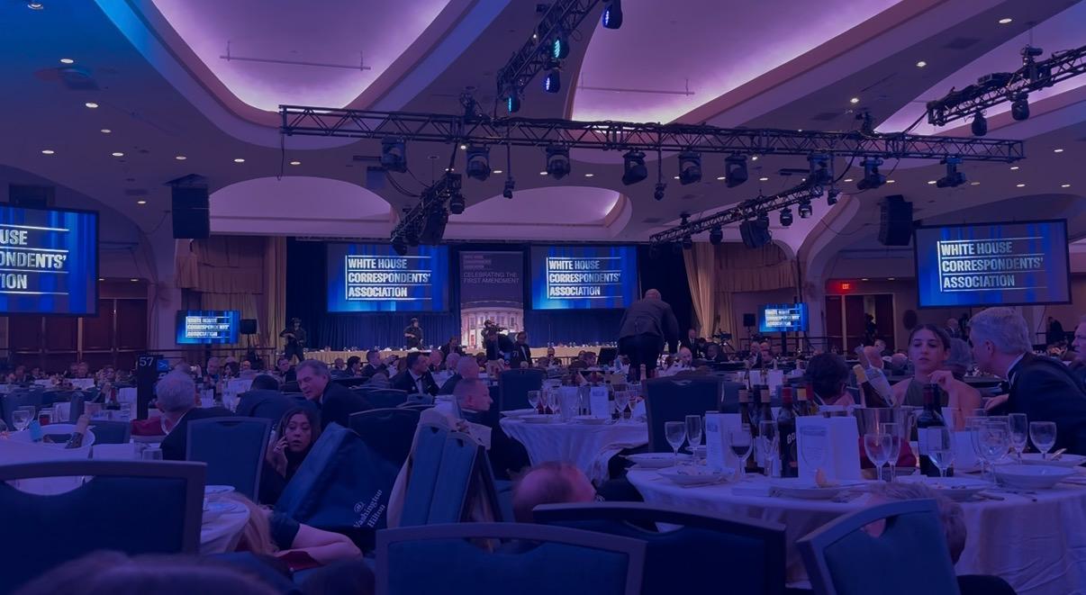 Attendees of the White House Correspondents' Dinner duck for cover after shots were fired at the Washington Hilton, April 25, 2026. Credit: Kirk A. Bado