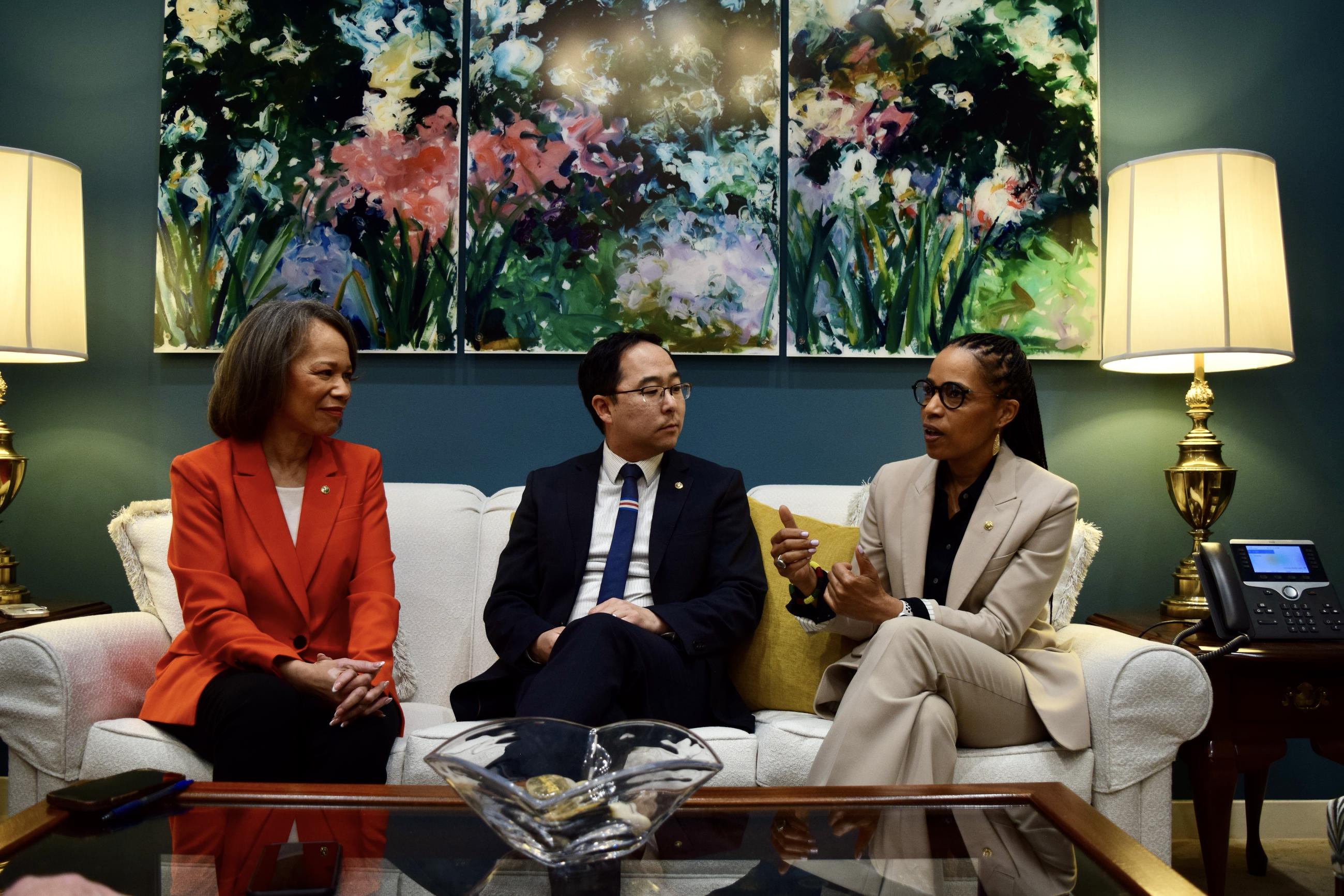 Sens. Lisa Blunt Rochester and Andy Kim listen as Sen. Angela Alsobrooks talks about her priorities for health care. (Photo by Taameen Mohammad)