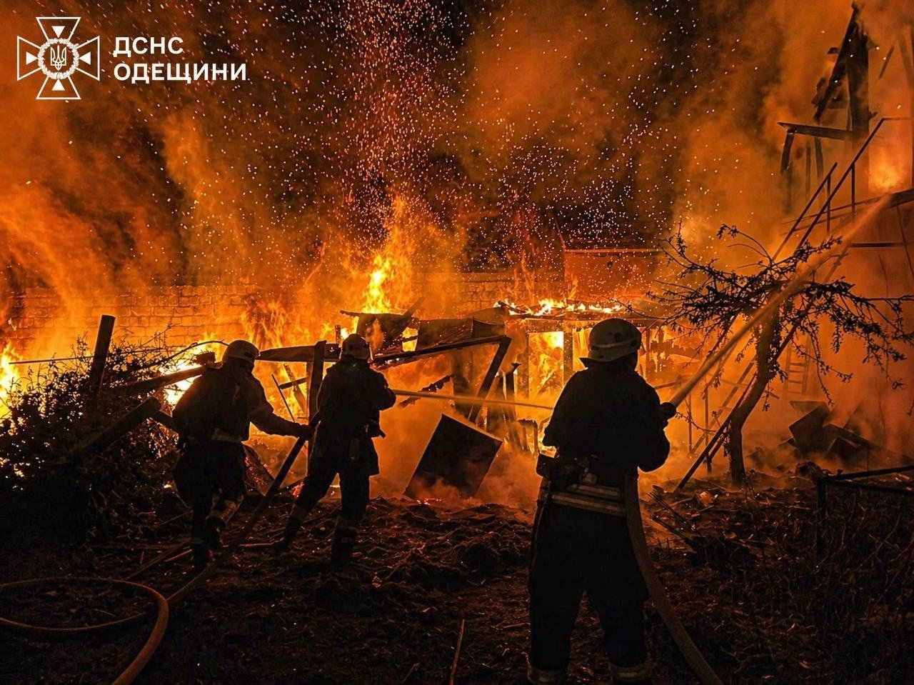 In this photo provided by the Ukrainian Emergency Service on April 29, rescue workers fight a fire at a residential building destroyed by a Russian drone strike on Odesa region, Ukraine. (Ukrainian Emergency Service via AP)