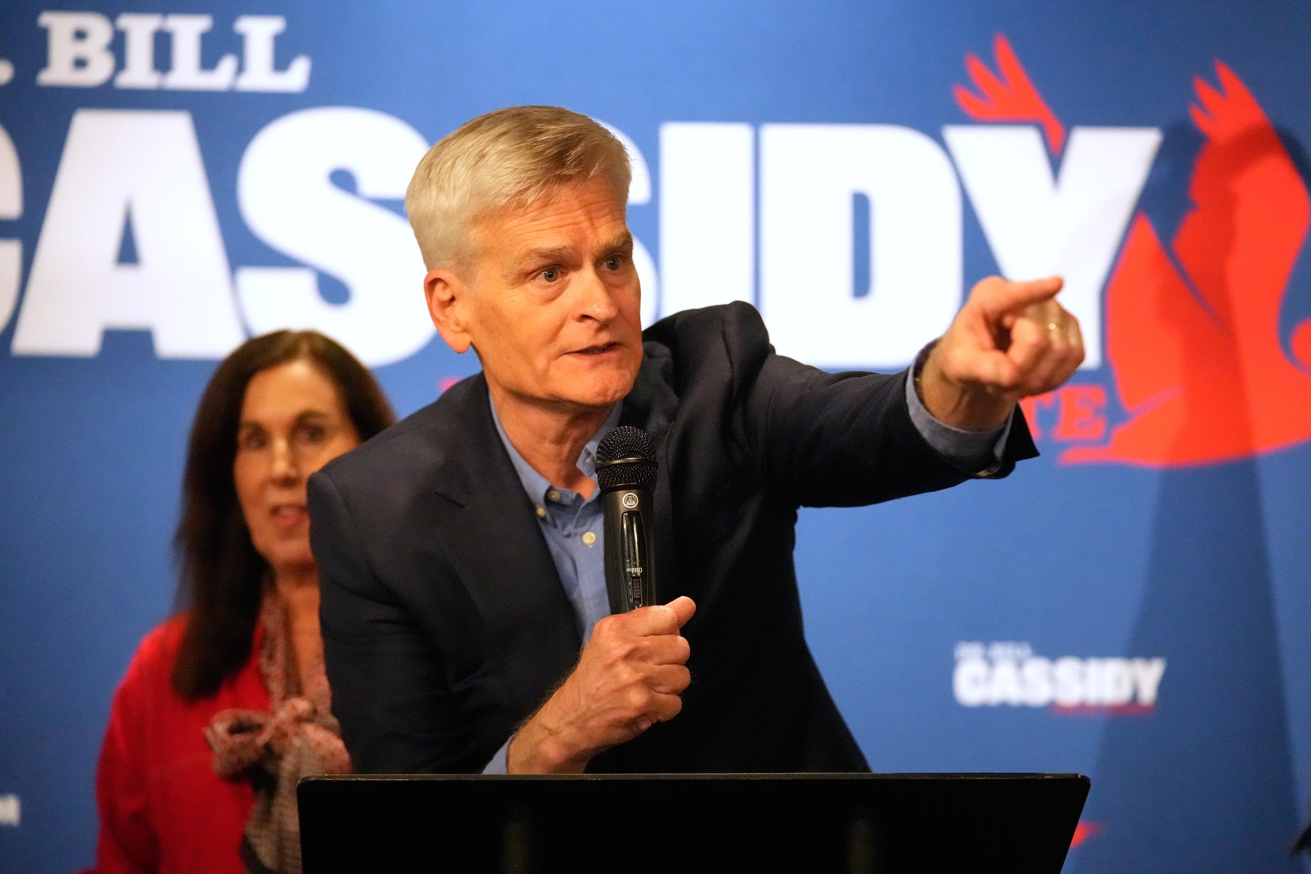 Sen. Bill Cassidy greets supporters with his wife, Laura, at a campaign stop in Metairie, La., on May 5. (AP Photo/Gerald Herbert)