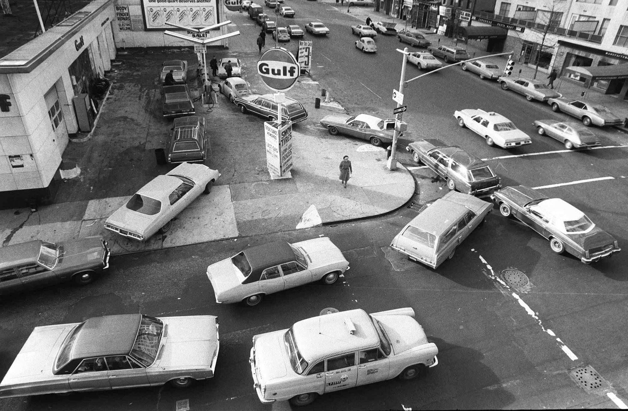 Cars line up in two directions at a gas station in New York City during the 1973 oil embargo. (AP Photo/Marty Lederhandler, File)
