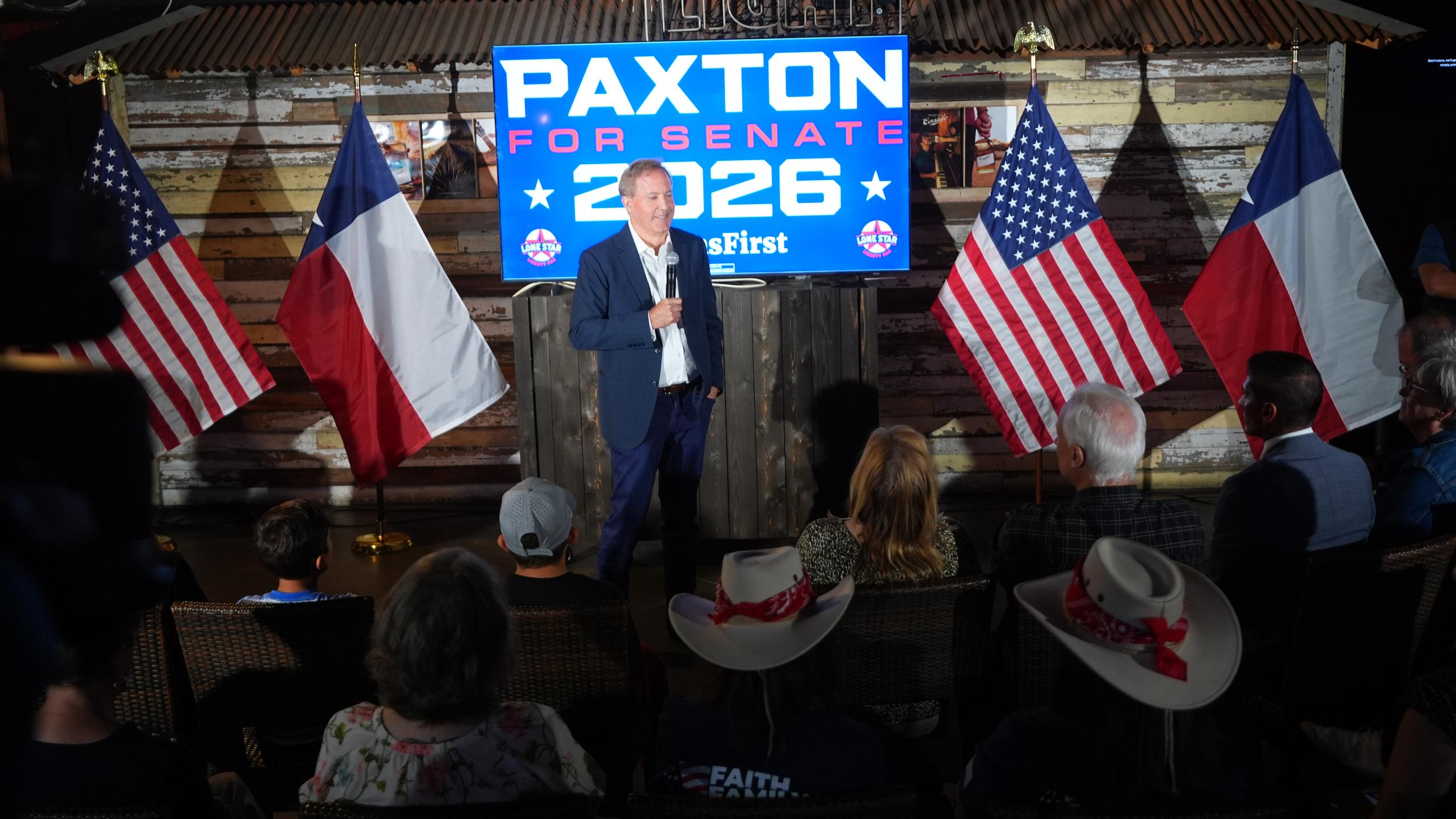 Texas Attorney General Ken Paxton, a Republican candidate for the U.S. Senate, speaks to supporters at a campaign event in McKinney, Texas, Tuesday, May 19, 2026. (AP Photo/LM Otero)