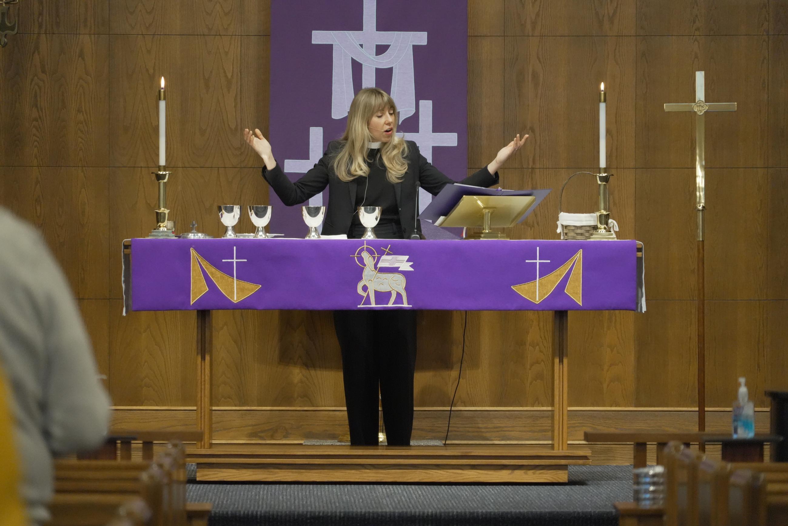 The Rev. Sarah Trone Garriott, a Lutheran pastor and Iowa state senator, celebrates communion at Grace Lutheran Church in Des Moines on March 15. (AP Photo/Krysta Fauria)