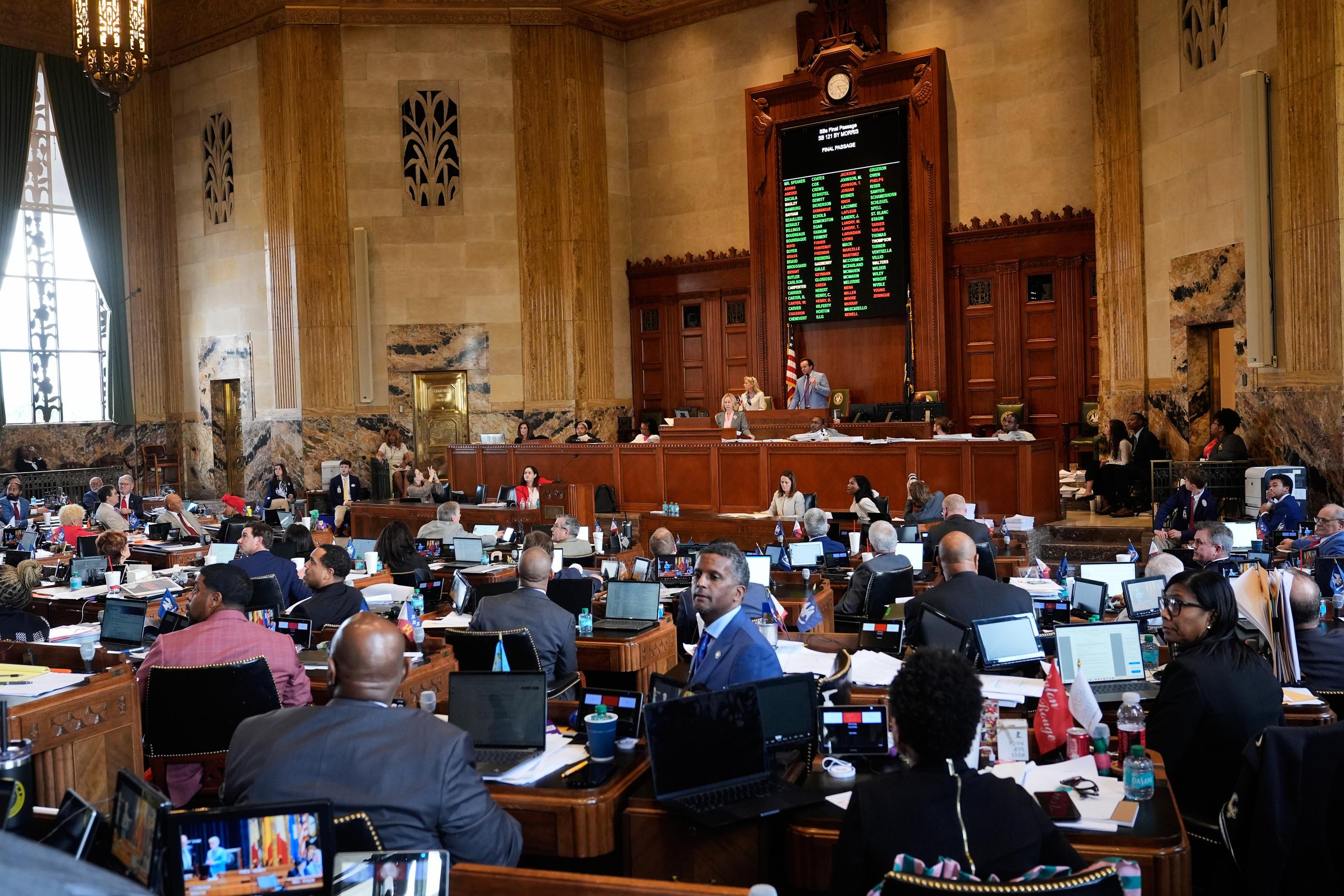 Rep. Edmond Jordan, D-Dist. 29, center, looks up after a redistricting plan to eliminate a majority-Black congressional district, in response to a U.S. Supreme Court ruling, was passed by the House in Baton Rouge, La., Thursday, May 28, 2026. (AP Photo/Gerald Herbert)