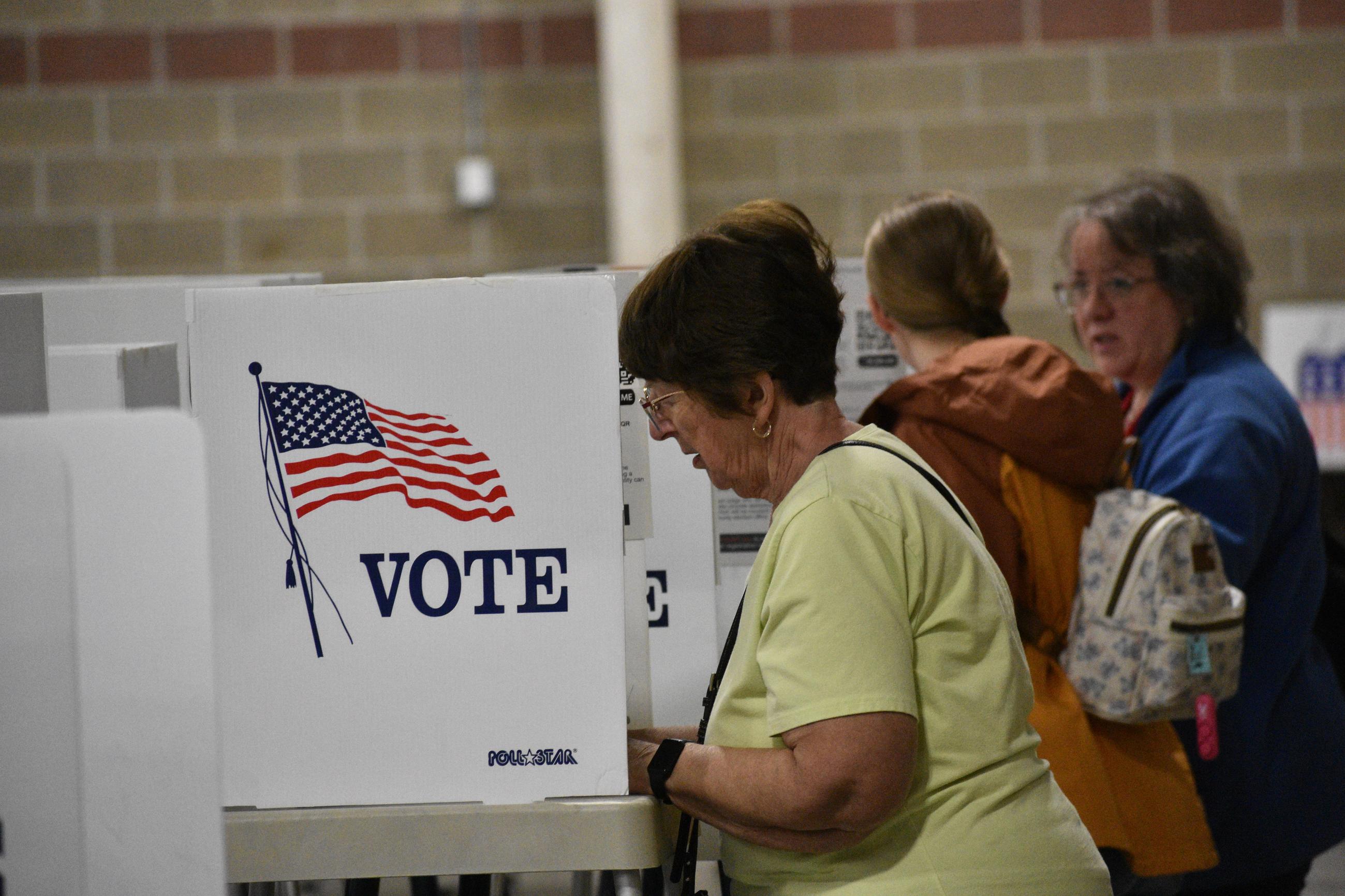 Voters fill out their ballots at Yellowstone County's MetraPark, Tuesday, June 2, 2026, in Billings, Montana. (AP Photo/Matthew Brown)